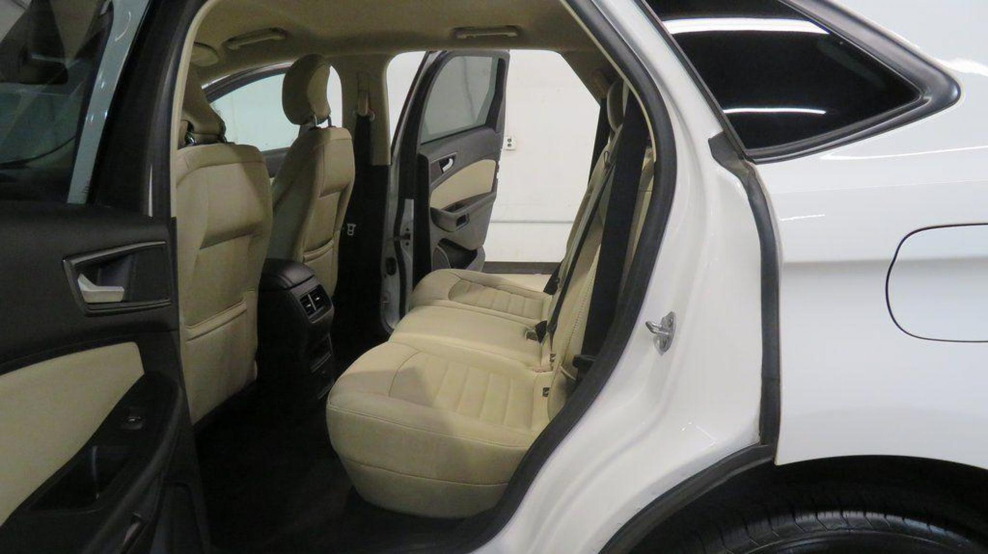 2019 Oxford White /Dune Ford Edge SE (2FMPK3G95KB) with an EcoBoost 2.0L I4 GTDi DOHC Turbocharged VCT engine, Automatic transmission, located at 15300 Midway Rd., Addison, TX, 75001, (972) 702-0011, 32.958321, -96.838074 - 2019 Ford Edge SE<br>Available Now at Midway Auto Group Addison, Texas<br><br>Step into comfort and confidence with this stylish 2019 Ford Edge SE. Designed to provide a perfect blend of performance, technology, and versatility, the Edge makes every drive enjoyablewhether navigating the streets of - Photo#16