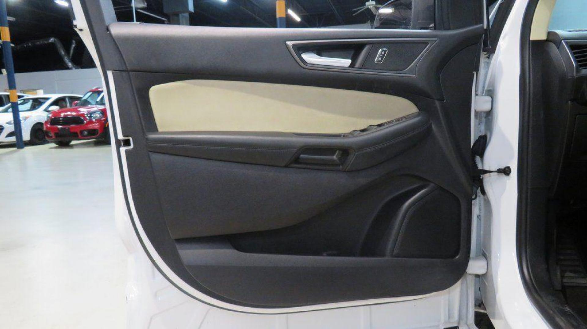 2019 Oxford White /Dune Ford Edge SE (2FMPK3G95KB) with an EcoBoost 2.0L I4 GTDi DOHC Turbocharged VCT engine, Automatic transmission, located at 15300 Midway Rd., Addison, TX, 75001, (972) 702-0011, 32.958321, -96.838074 - 2019 Ford Edge SE<br>Available Now at Midway Auto Group Addison, Texas<br><br>Step into comfort and confidence with this stylish 2019 Ford Edge SE. Designed to provide a perfect blend of performance, technology, and versatility, the Edge makes every drive enjoyablewhether navigating the streets of - Photo#26