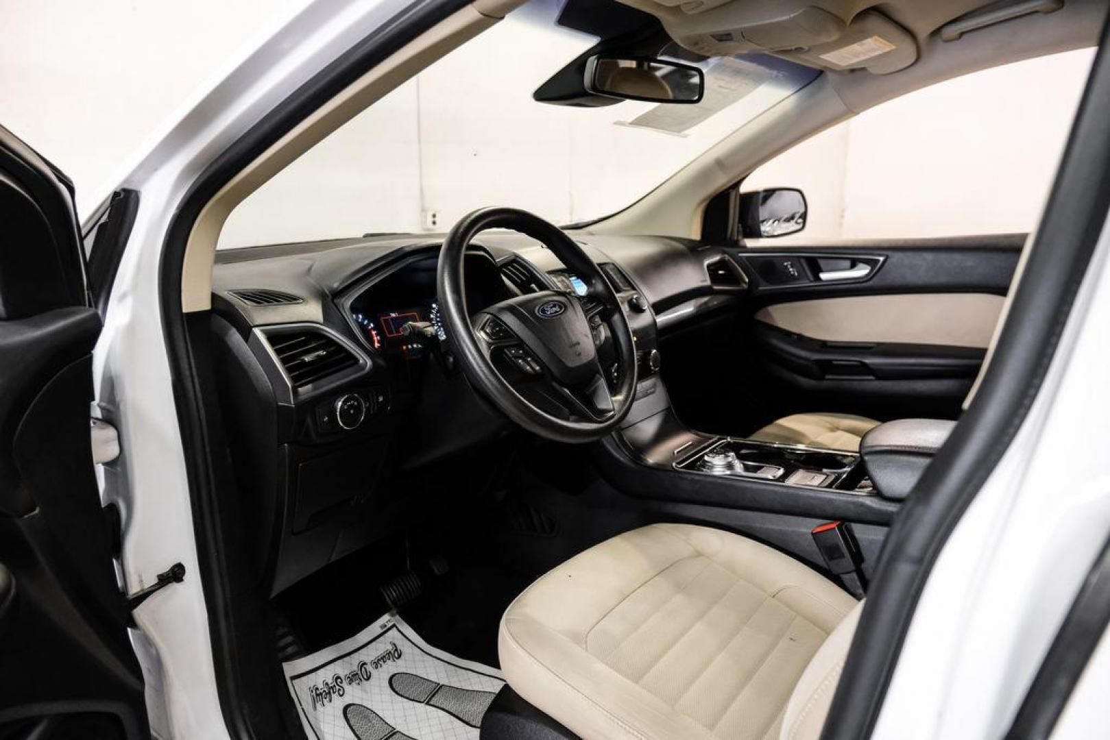 2019 Oxford White /Dune Ford Edge SE (2FMPK3G95KB) with an EcoBoost 2.0L I4 GTDi DOHC Turbocharged VCT engine, Automatic transmission, located at 15300 Midway Rd., Addison, TX, 75001, (972) 702-0011, 32.958321, -96.838074 - 2019 Ford Edge SE<br>Available Now at Midway Auto Group Addison, Texas<br><br>Step into comfort and confidence with this stylish 2019 Ford Edge SE. Designed to provide a perfect blend of performance, technology, and versatility, the Edge makes every drive enjoyablewhether navigating the streets of - Photo#2