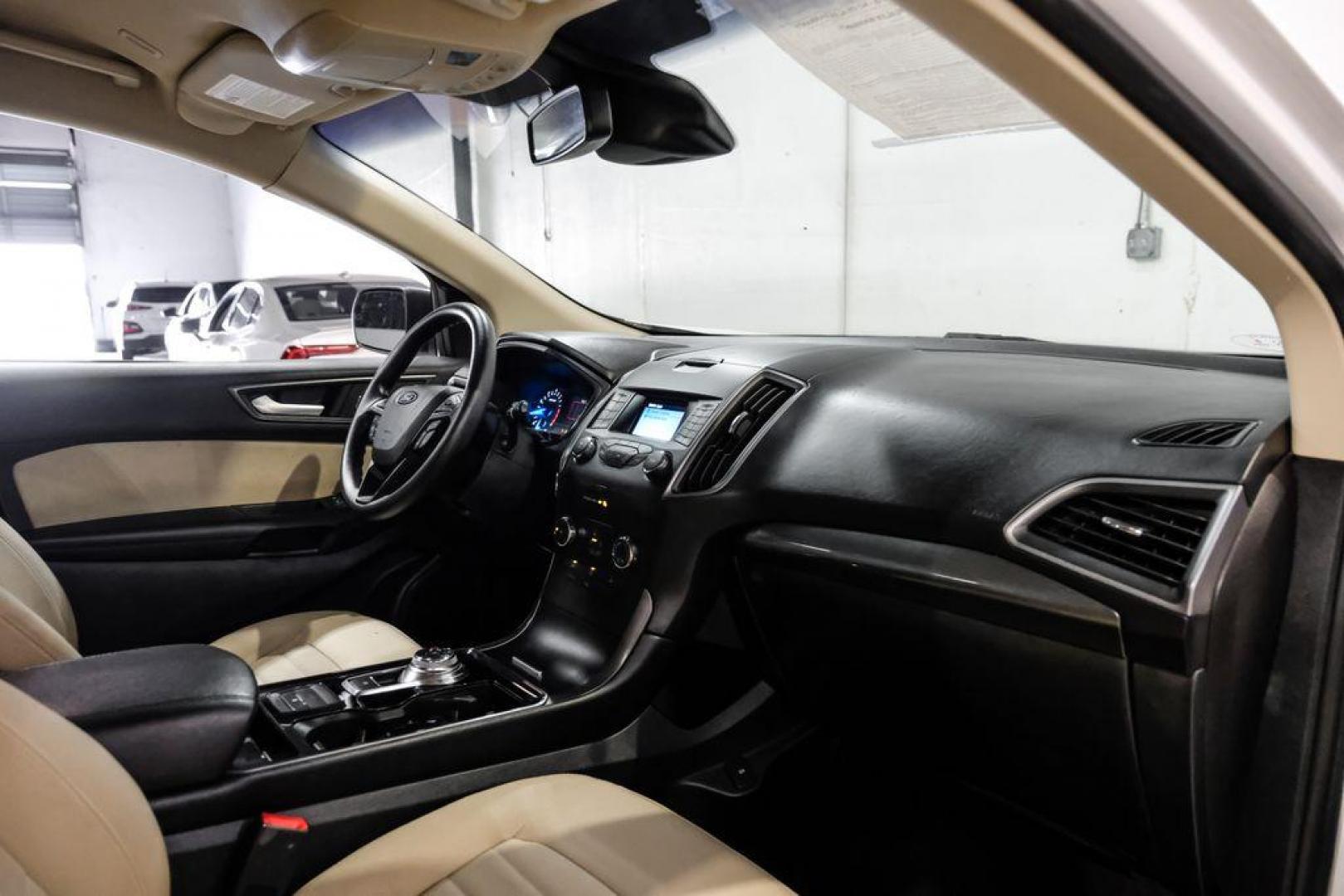 2019 Oxford White /Dune Ford Edge SE (2FMPK3G95KB) with an EcoBoost 2.0L I4 GTDi DOHC Turbocharged VCT engine, Automatic transmission, located at 15300 Midway Rd., Addison, TX, 75001, (972) 702-0011, 32.958321, -96.838074 - 2019 Ford Edge SE<br>Available Now at Midway Auto Group Addison, Texas<br><br>Step into comfort and confidence with this stylish 2019 Ford Edge SE. Designed to provide a perfect blend of performance, technology, and versatility, the Edge makes every drive enjoyablewhether navigating the streets of - Photo#12