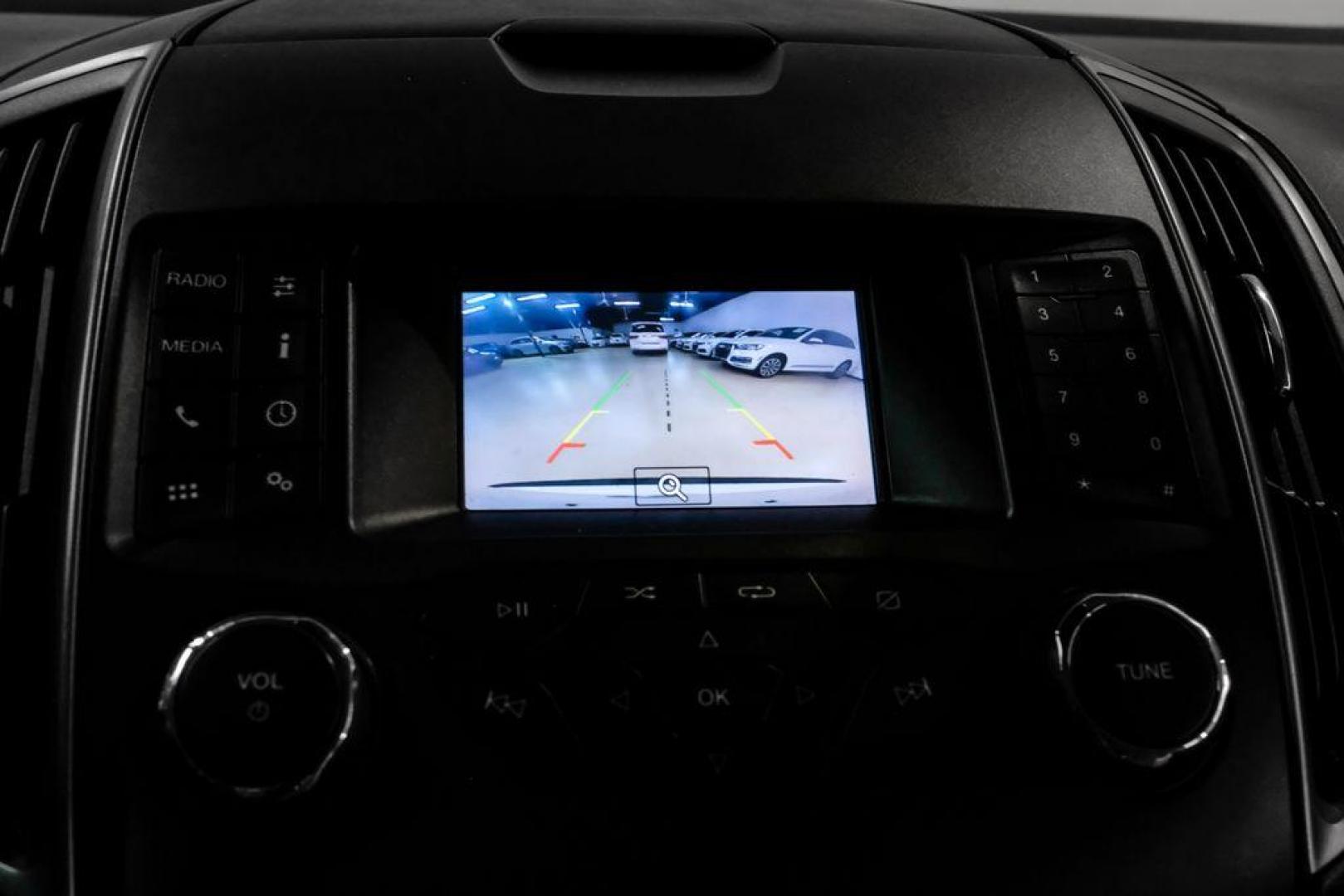 2019 Oxford White /Dune Ford Edge SE (2FMPK3G95KB) with an EcoBoost 2.0L I4 GTDi DOHC Turbocharged VCT engine, Automatic transmission, located at 15300 Midway Rd., Addison, TX, 75001, (972) 702-0011, 32.958321, -96.838074 - 2019 Ford Edge SE<br>Available Now at Midway Auto Group Addison, Texas<br><br>Step into comfort and confidence with this stylish 2019 Ford Edge SE. Designed to provide a perfect blend of performance, technology, and versatility, the Edge makes every drive enjoyablewhether navigating the streets of - Photo#19