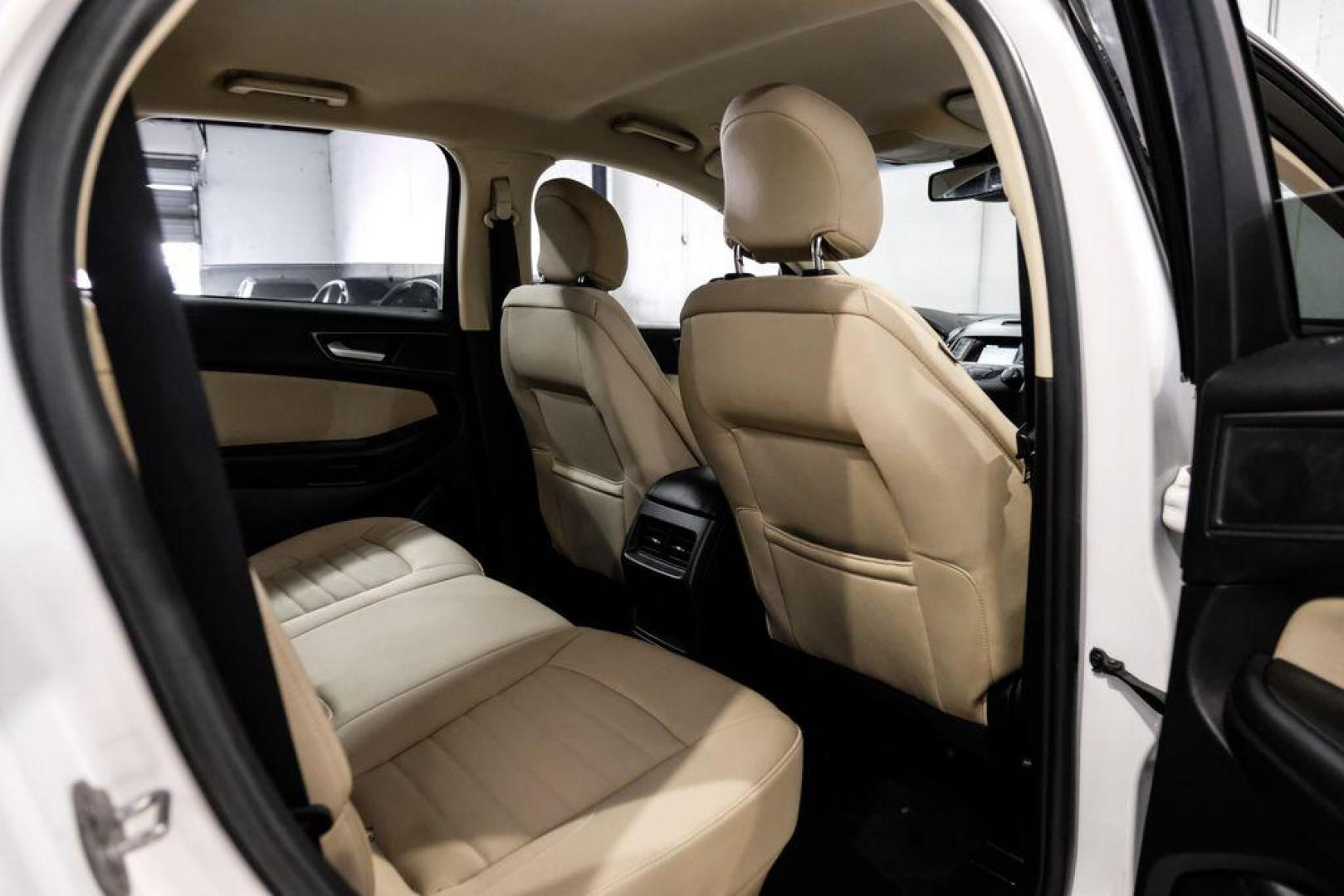 2019 Oxford White /Dune Ford Edge SE (2FMPK3G95KB) with an EcoBoost 2.0L I4 GTDi DOHC Turbocharged VCT engine, Automatic transmission, located at 15300 Midway Rd., Addison, TX, 75001, (972) 702-0011, 32.958321, -96.838074 - 2019 Ford Edge SE<br>Available Now at Midway Auto Group Addison, Texas<br><br>Step into comfort and confidence with this stylish 2019 Ford Edge SE. Designed to provide a perfect blend of performance, technology, and versatility, the Edge makes every drive enjoyablewhether navigating the streets of - Photo#31