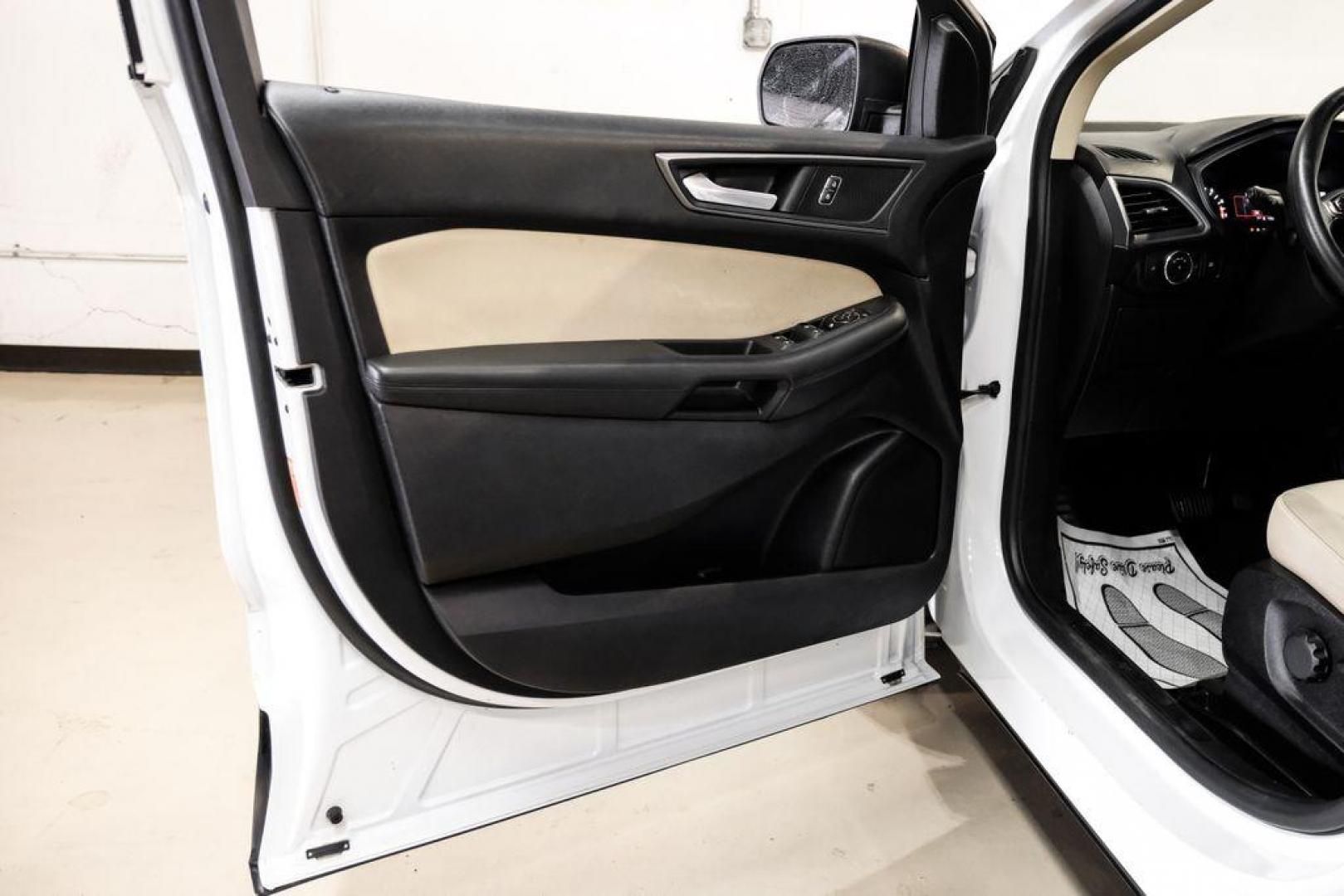 2019 Oxford White /Dune Ford Edge SE (2FMPK3G95KB) with an EcoBoost 2.0L I4 GTDi DOHC Turbocharged VCT engine, Automatic transmission, located at 15300 Midway Rd., Addison, TX, 75001, (972) 702-0011, 32.958321, -96.838074 - 2019 Ford Edge SE<br>Available Now at Midway Auto Group Addison, Texas<br><br>Step into comfort and confidence with this stylish 2019 Ford Edge SE. Designed to provide a perfect blend of performance, technology, and versatility, the Edge makes every drive enjoyablewhether navigating the streets of - Photo#36