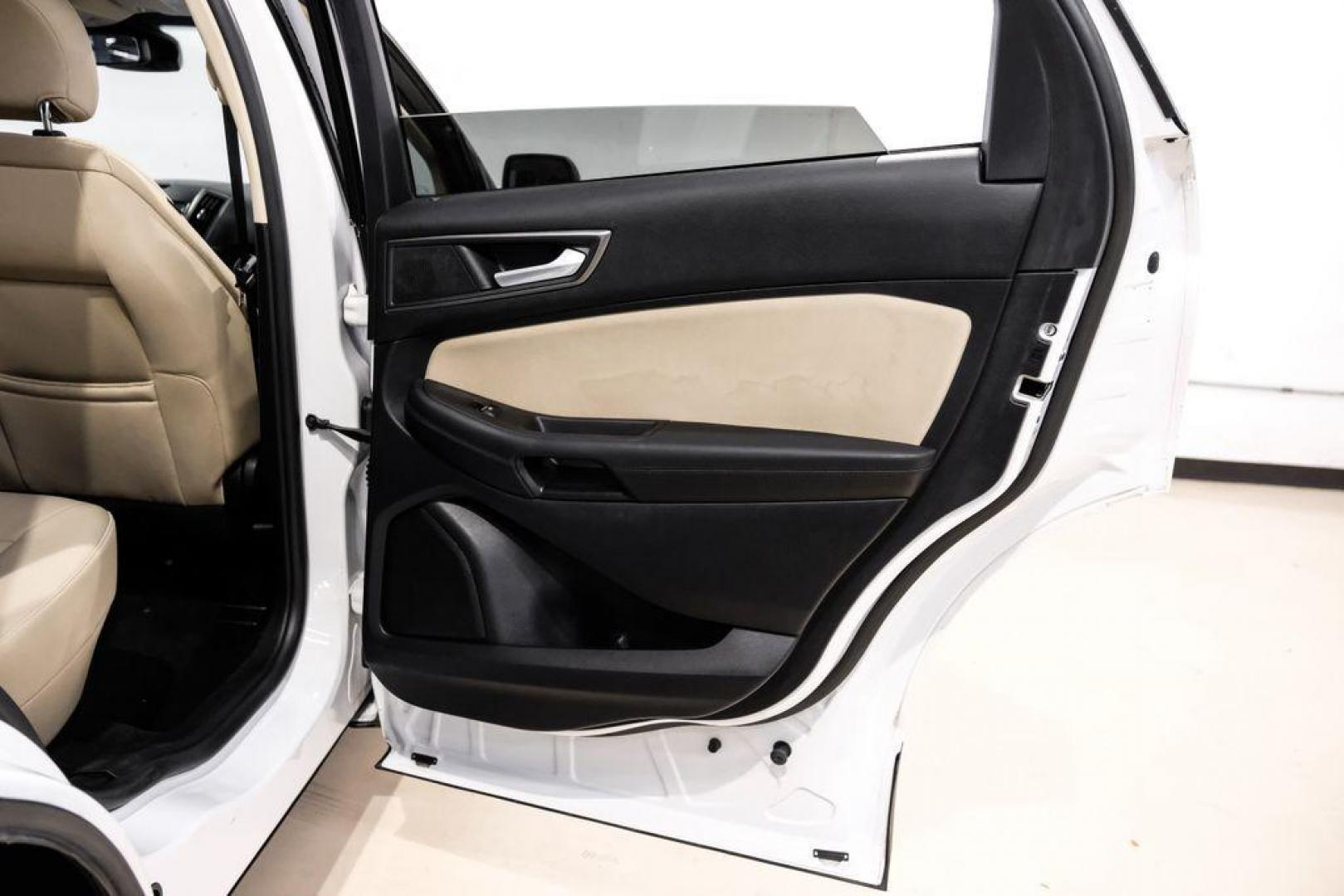 2019 Oxford White /Dune Ford Edge SE (2FMPK3G95KB) with an EcoBoost 2.0L I4 GTDi DOHC Turbocharged VCT engine, Automatic transmission, located at 15300 Midway Rd., Addison, TX, 75001, (972) 702-0011, 32.958321, -96.838074 - 2019 Ford Edge SE<br>Available Now at Midway Auto Group Addison, Texas<br><br>Step into comfort and confidence with this stylish 2019 Ford Edge SE. Designed to provide a perfect blend of performance, technology, and versatility, the Edge makes every drive enjoyablewhether navigating the streets of - Photo#40