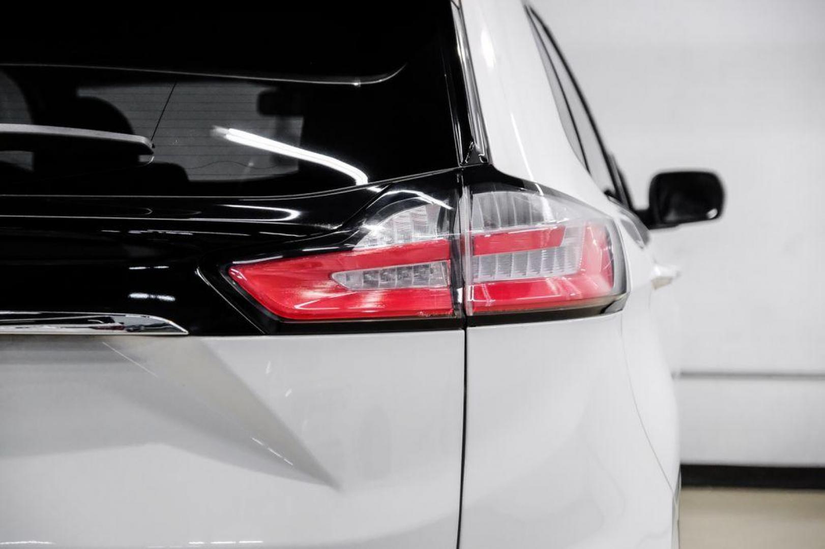 2019 Oxford White /Dune Ford Edge SE (2FMPK3G95KB) with an EcoBoost 2.0L I4 GTDi DOHC Turbocharged VCT engine, Automatic transmission, located at 15300 Midway Rd., Addison, TX, 75001, (972) 702-0011, 32.958321, -96.838074 - 2019 Ford Edge SE<br>Available Now at Midway Auto Group Addison, Texas<br><br>Step into comfort and confidence with this stylish 2019 Ford Edge SE. Designed to provide a perfect blend of performance, technology, and versatility, the Edge makes every drive enjoyablewhether navigating the streets of - Photo#42