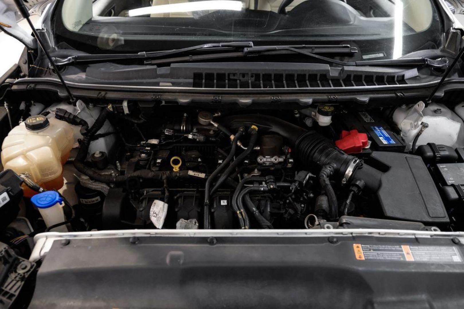 2019 Oxford White /Dune Ford Edge SE (2FMPK3G95KB) with an EcoBoost 2.0L I4 GTDi DOHC Turbocharged VCT engine, Automatic transmission, located at 15300 Midway Rd., Addison, TX, 75001, (972) 702-0011, 32.958321, -96.838074 - 2019 Ford Edge SE<br>Available Now at Midway Auto Group Addison, Texas<br><br>Step into comfort and confidence with this stylish 2019 Ford Edge SE. Designed to provide a perfect blend of performance, technology, and versatility, the Edge makes every drive enjoyablewhether navigating the streets of - Photo#44