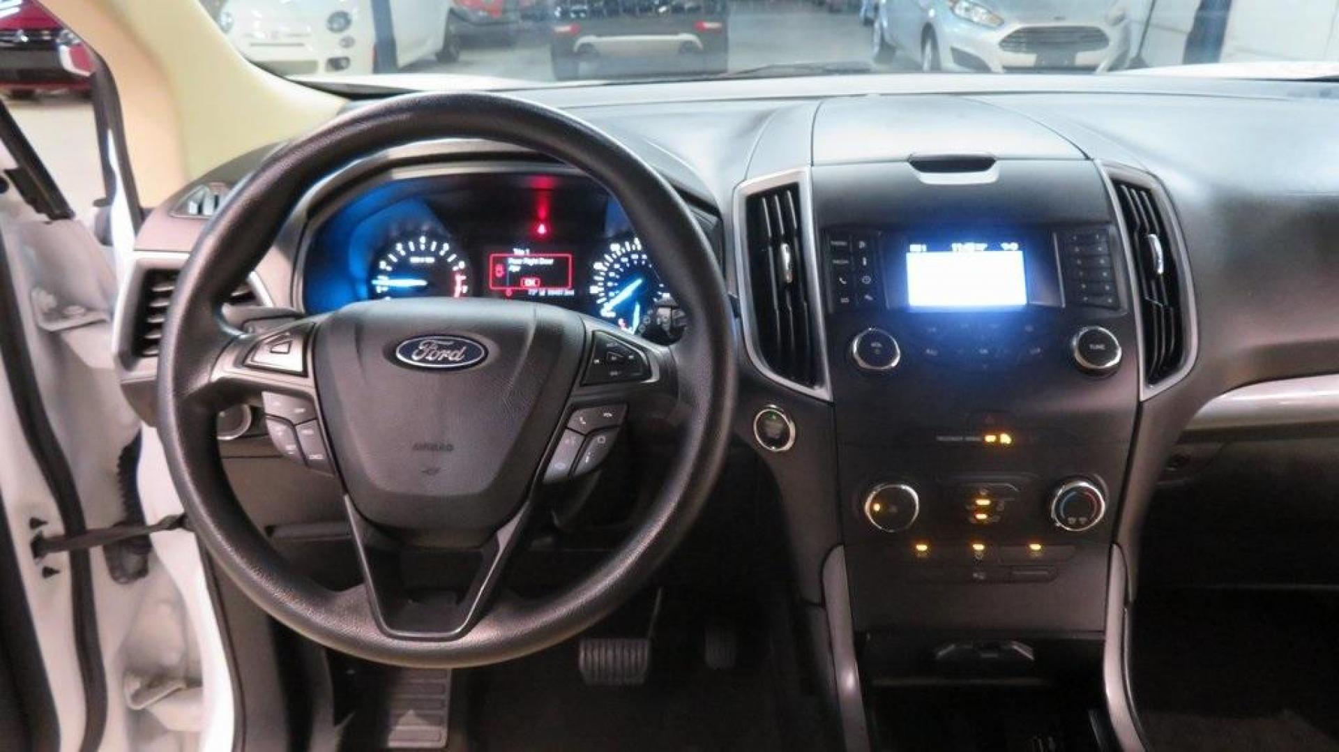 2019 Oxford White /Dune Ford Edge SE (2FMPK3G95KB) with an EcoBoost 2.0L I4 GTDi DOHC Turbocharged VCT engine, Automatic transmission, located at 15300 Midway Rd., Addison, TX, 75001, (972) 702-0011, 32.958321, -96.838074 - 2019 Ford Edge SE<br>Available Now at Midway Auto Group Addison, Texas<br><br>Step into comfort and confidence with this stylish 2019 Ford Edge SE. Designed to provide a perfect blend of performance, technology, and versatility, the Edge makes every drive enjoyablewhether navigating the streets of - Photo#17