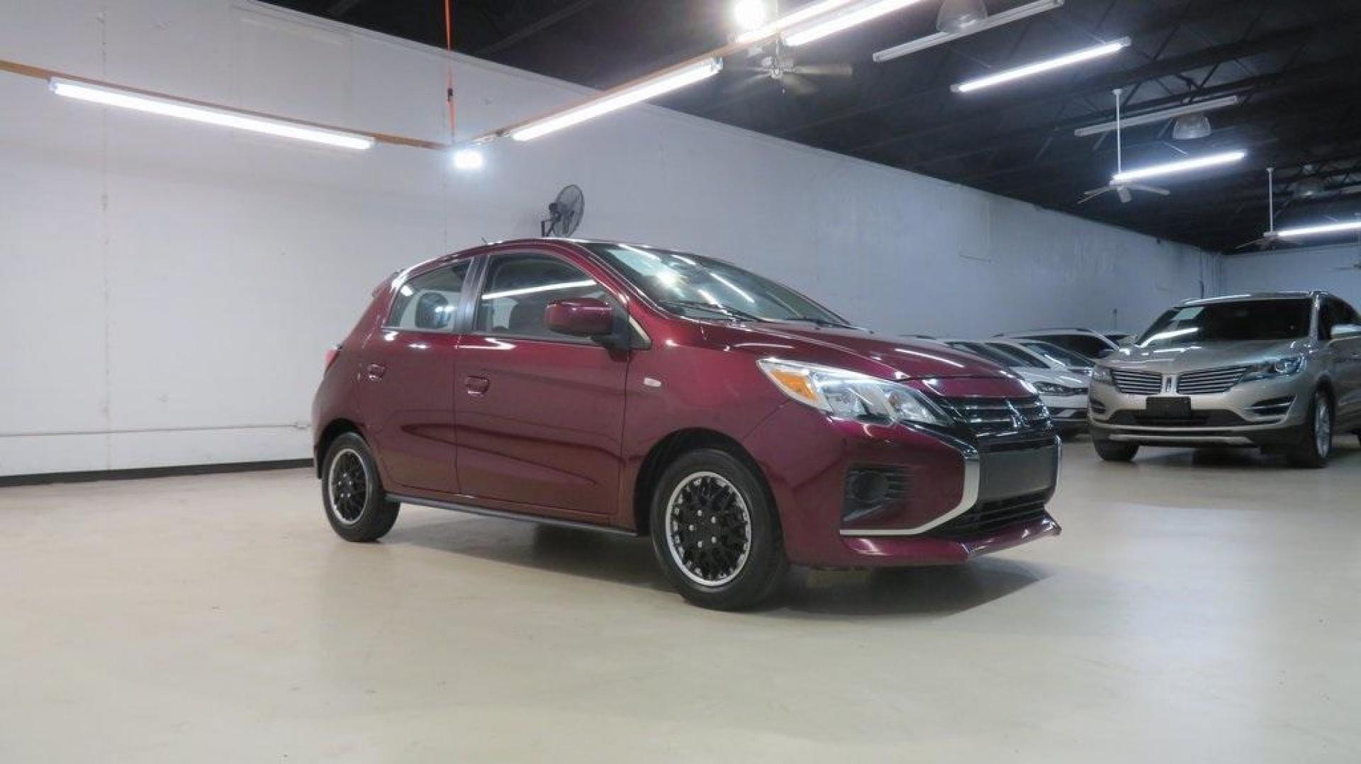 2021 Red /Black Mitsubishi Mirage ES (ML32AUHJ0MH) with an 1.2L 3-Cylinder DOHC MIVEC engine, CVT transmission, located at 15300 Midway Rd., Addison, TX, 75001, (972) 702-0011, 32.958321, -96.838074 - 2021 Mitsubishi Mirage SE<br>Now Available at Midway Auto Group Addison, Texas<br><br>Efficient, stylish, and packed with smart features, the 2021 Mitsubishi Mirage SE is the perfect choice for drivers seeking affordability without sacrificing comfort or convenience. Whether you're navigating the c - Photo#6