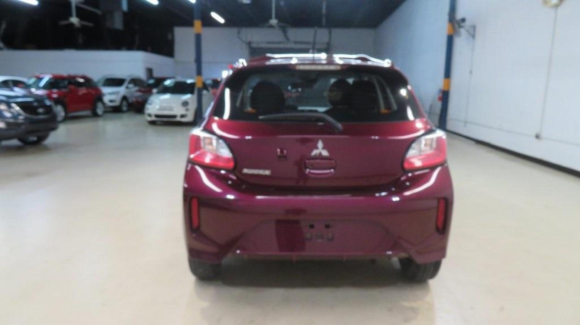 2021 Red /Black Mitsubishi Mirage ES (ML32AUHJ0MH) with an 1.2L 3-Cylinder DOHC MIVEC engine, CVT transmission, located at 15300 Midway Rd., Addison, TX, 75001, (972) 702-0011, 32.958321, -96.838074 - 2021 Mitsubishi Mirage SE<br>Now Available at Midway Auto Group Addison, Texas<br><br>Efficient, stylish, and packed with smart features, the 2021 Mitsubishi Mirage SE is the perfect choice for drivers seeking affordability without sacrificing comfort or convenience. Whether you're navigating the c - Photo#7
