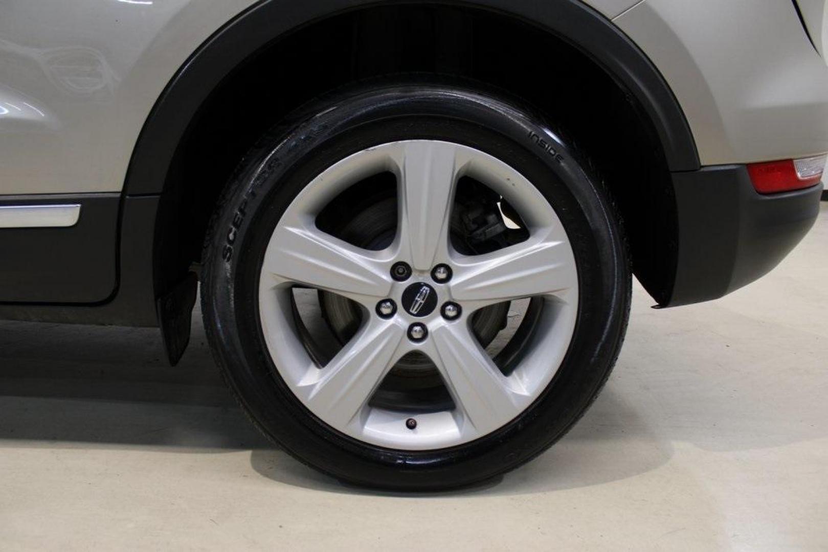 2015 Silver Sand /Ebony Lincoln MKC Base (5LMCJ1A95FU) with an EcoBoost 2.0L I4 GTDi DOHC Turbocharged VCT engine, Automatic transmission, located at 15300 Midway Rd., Addison, TX, 75001, (972) 702-0011, 32.958321, -96.838074 - 2015 Lincoln MKC<br>Available Now at Midway Auto Group Addison, Texas<br><br>Discover refined luxury and dynamic performance in this stunning 2015 Lincoln MKC. Designed for those who seek style, comfort, and a sophisticated driving experience, this premium crossover is perfectly suited for navigati - Photo#9