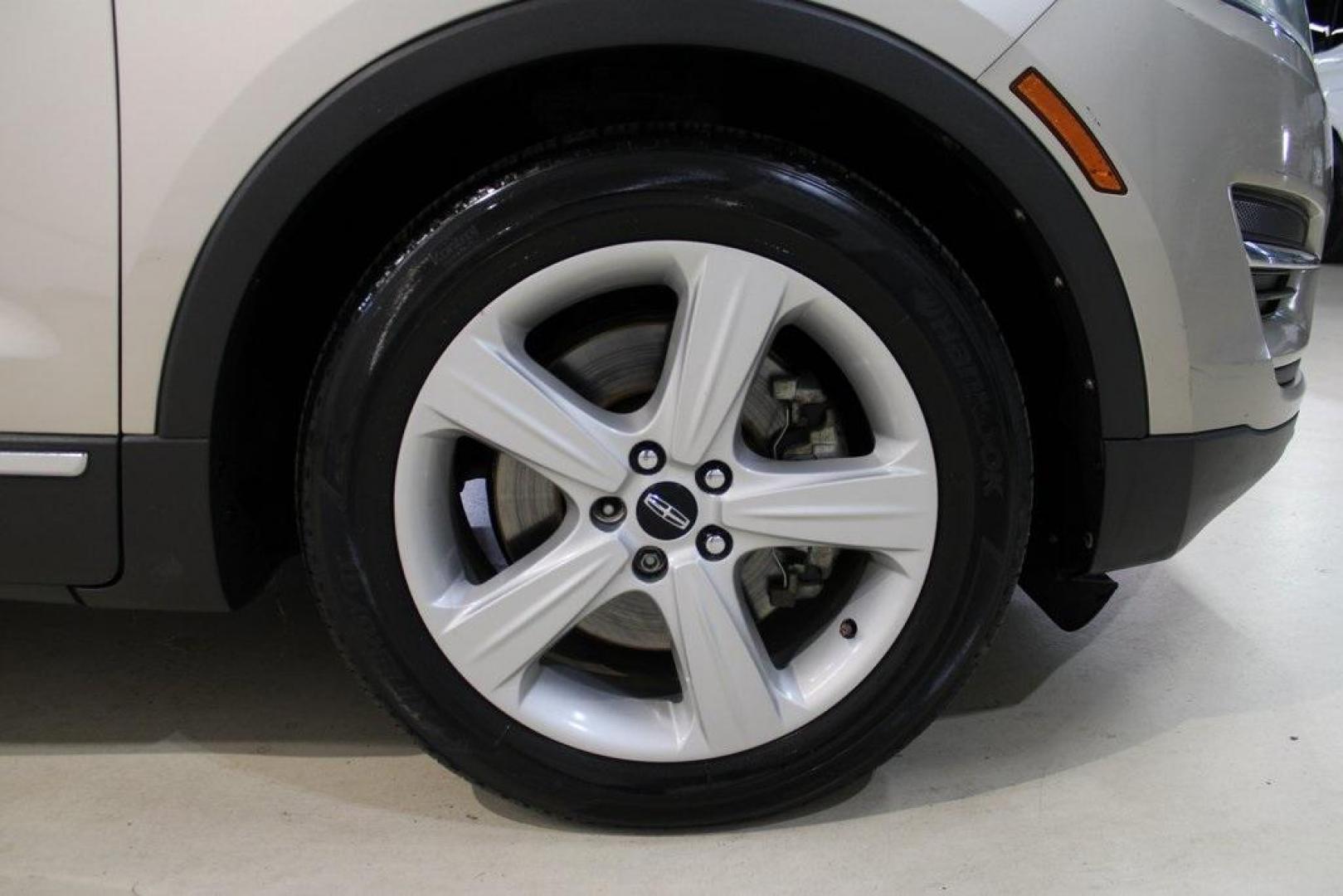 2015 Silver Sand /Ebony Lincoln MKC Base (5LMCJ1A95FU) with an EcoBoost 2.0L I4 GTDi DOHC Turbocharged VCT engine, Automatic transmission, located at 15300 Midway Rd., Addison, TX, 75001, (972) 702-0011, 32.958321, -96.838074 - 2015 Lincoln MKC<br>Available Now at Midway Auto Group Addison, Texas<br><br>Discover refined luxury and dynamic performance in this stunning 2015 Lincoln MKC. Designed for those who seek style, comfort, and a sophisticated driving experience, this premium crossover is perfectly suited for navigati - Photo#11
