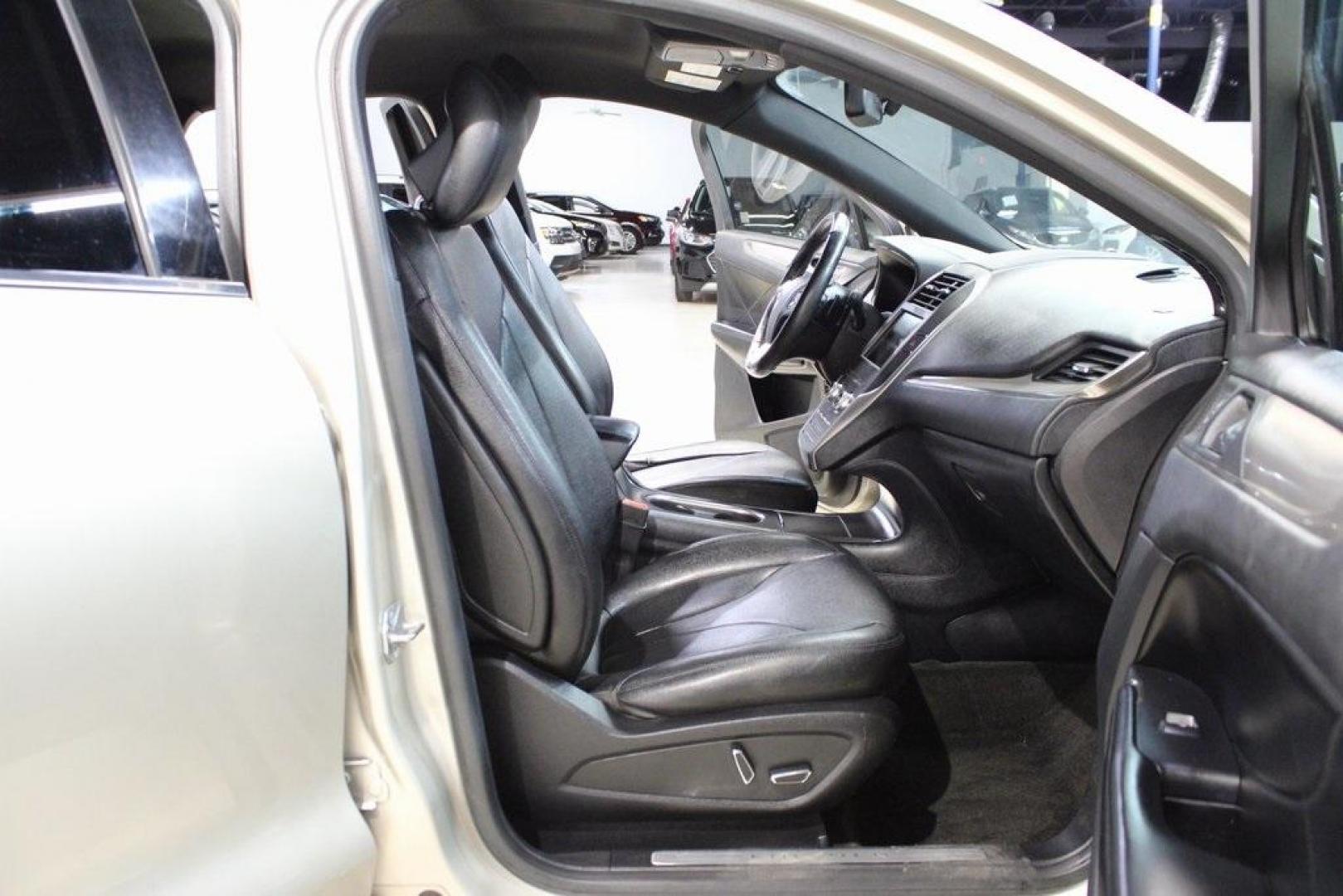 2015 Silver Sand /Ebony Lincoln MKC Base (5LMCJ1A95FU) with an EcoBoost 2.0L I4 GTDi DOHC Turbocharged VCT engine, Automatic transmission, located at 15300 Midway Rd., Addison, TX, 75001, (972) 702-0011, 32.958321, -96.838074 - 2015 Lincoln MKC<br>Available Now at Midway Auto Group Addison, Texas<br><br>Discover refined luxury and dynamic performance in this stunning 2015 Lincoln MKC. Designed for those who seek style, comfort, and a sophisticated driving experience, this premium crossover is perfectly suited for navigati - Photo#14