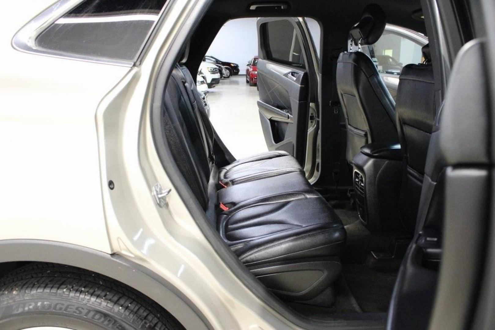 2015 Silver Sand /Ebony Lincoln MKC Base (5LMCJ1A95FU) with an EcoBoost 2.0L I4 GTDi DOHC Turbocharged VCT engine, Automatic transmission, located at 15300 Midway Rd., Addison, TX, 75001, (972) 702-0011, 32.958321, -96.838074 - 2015 Lincoln MKC<br>Available Now at Midway Auto Group Addison, Texas<br><br>Discover refined luxury and dynamic performance in this stunning 2015 Lincoln MKC. Designed for those who seek style, comfort, and a sophisticated driving experience, this premium crossover is perfectly suited for navigati - Photo#15