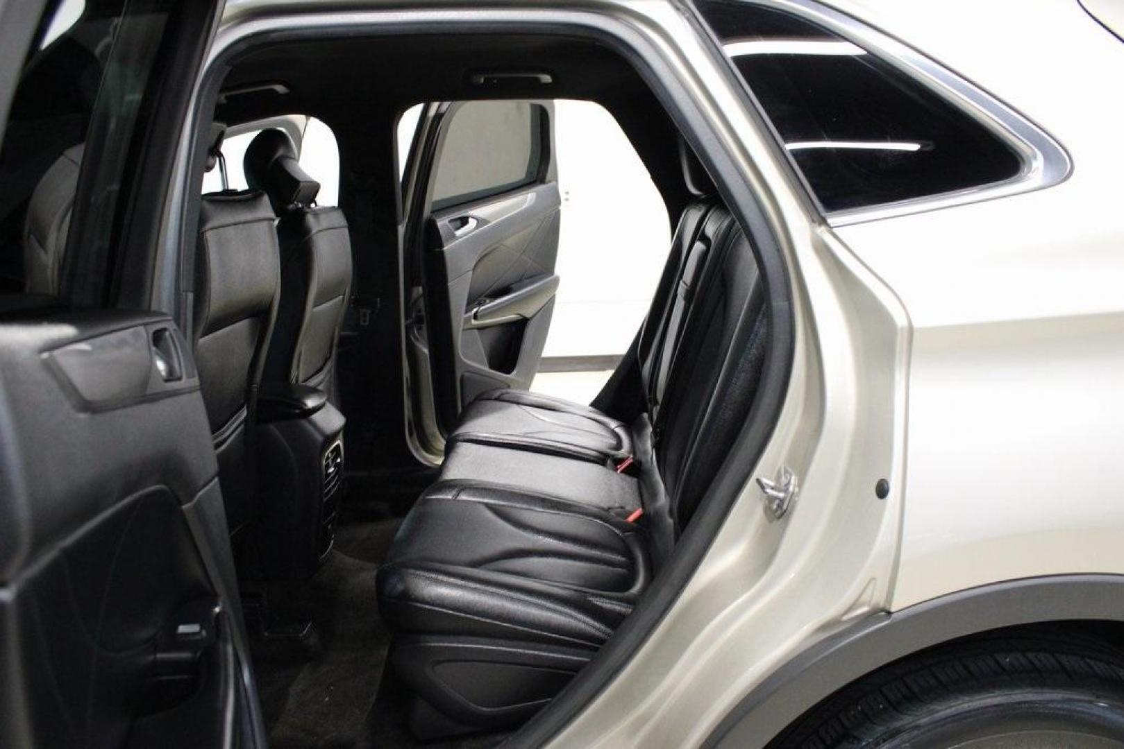 2015 Silver Sand /Ebony Lincoln MKC Base (5LMCJ1A95FU) with an EcoBoost 2.0L I4 GTDi DOHC Turbocharged VCT engine, Automatic transmission, located at 15300 Midway Rd., Addison, TX, 75001, (972) 702-0011, 32.958321, -96.838074 - 2015 Lincoln MKC<br>Available Now at Midway Auto Group Addison, Texas<br><br>Discover refined luxury and dynamic performance in this stunning 2015 Lincoln MKC. Designed for those who seek style, comfort, and a sophisticated driving experience, this premium crossover is perfectly suited for navigati - Photo#16
