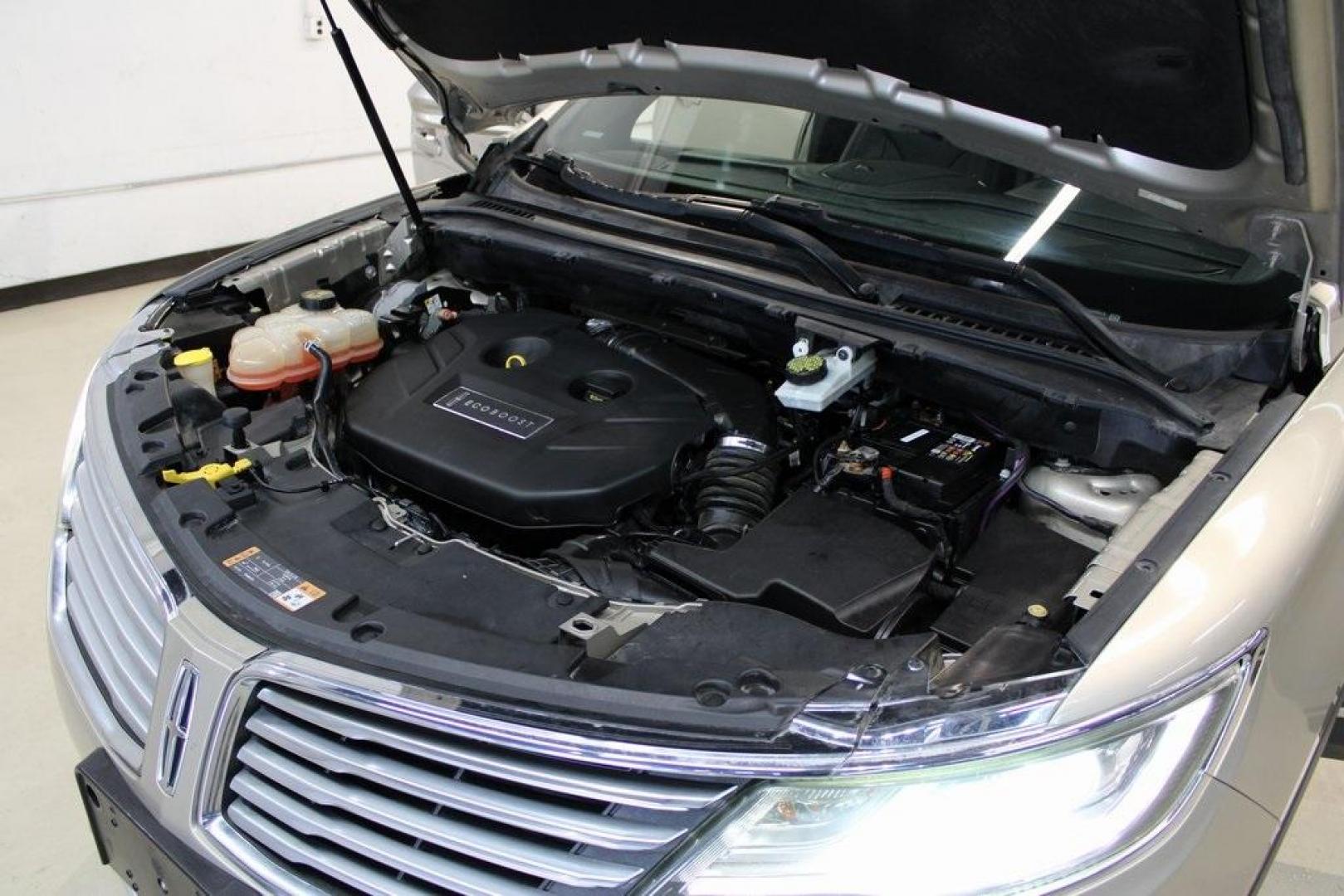 2015 Silver Sand /Ebony Lincoln MKC Base (5LMCJ1A95FU) with an EcoBoost 2.0L I4 GTDi DOHC Turbocharged VCT engine, Automatic transmission, located at 15300 Midway Rd., Addison, TX, 75001, (972) 702-0011, 32.958321, -96.838074 - 2015 Lincoln MKC<br>Available Now at Midway Auto Group Addison, Texas<br><br>Discover refined luxury and dynamic performance in this stunning 2015 Lincoln MKC. Designed for those who seek style, comfort, and a sophisticated driving experience, this premium crossover is perfectly suited for navigati - Photo#27
