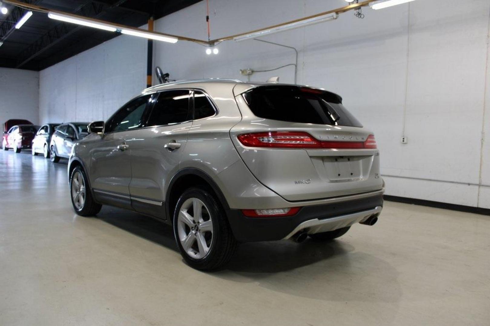 2015 Silver Sand /Ebony Lincoln MKC Base (5LMCJ1A95FU) with an EcoBoost 2.0L I4 GTDi DOHC Turbocharged VCT engine, Automatic transmission, located at 15300 Midway Rd., Addison, TX, 75001, (972) 702-0011, 32.958321, -96.838074 - 2015 Lincoln MKC<br>Available Now at Midway Auto Group Addison, Texas<br><br>Discover refined luxury and dynamic performance in this stunning 2015 Lincoln MKC. Designed for those who seek style, comfort, and a sophisticated driving experience, this premium crossover is perfectly suited for navigati - Photo#3