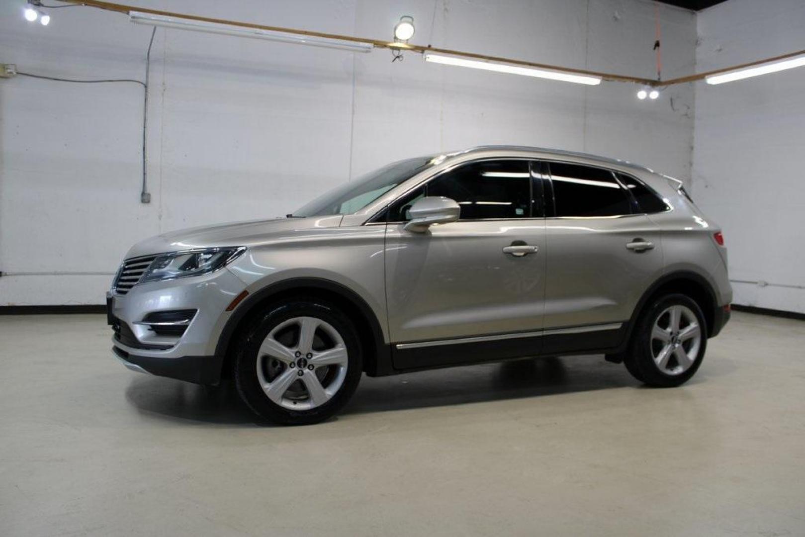 2015 Silver Sand /Ebony Lincoln MKC Base (5LMCJ1A95FU) with an EcoBoost 2.0L I4 GTDi DOHC Turbocharged VCT engine, Automatic transmission, located at 15300 Midway Rd., Addison, TX, 75001, (972) 702-0011, 32.958321, -96.838074 - 2015 Lincoln MKC<br>Available Now at Midway Auto Group Addison, Texas<br><br>Discover refined luxury and dynamic performance in this stunning 2015 Lincoln MKC. Designed for those who seek style, comfort, and a sophisticated driving experience, this premium crossover is perfectly suited for navigati - Photo#4