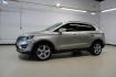 2015 Silver Sand /Ebony Lincoln MKC Base (5LMCJ1A95FU) with an EcoBoost 2.0L I4 GTDi DOHC Turbocharged VCT engine, Automatic transmission, located at 15300 Midway Rd., Addison, TX, 75001, (972) 702-0011, 32.958321, -96.838074 - 2015 Lincoln MKC<br>Available Now at Midway Auto Group Addison, Texas<br><br>Discover refined luxury and dynamic performance in this stunning 2015 Lincoln MKC. Designed for those who seek style, comfort, and a sophisticated driving experience, this premium crossover is perfectly suited for navigati - Photo#4