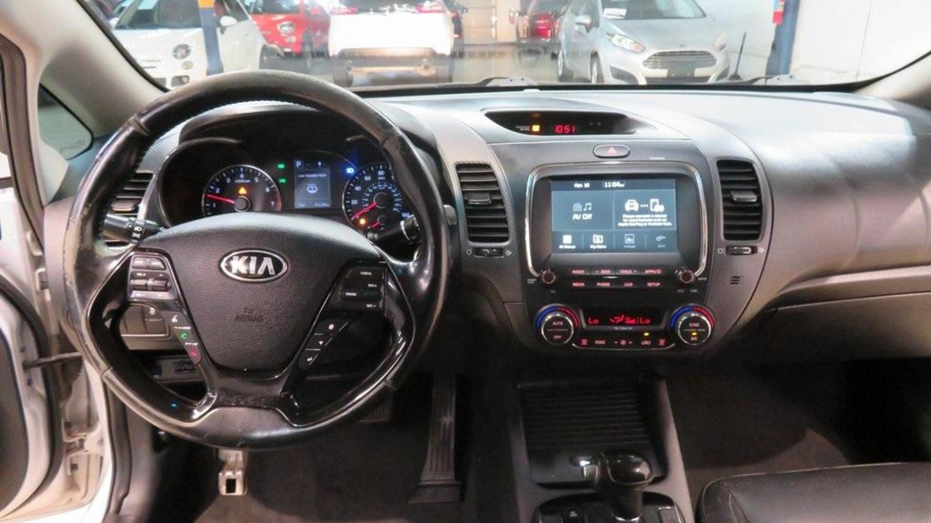2017 Silky Silver /Black Kia Forte EX (3KPFL4A8XHE) with an 2.0L I4 DOHC Dual CVVT engine, Automatic transmission, located at 15300 Midway Rd., Addison, TX, 75001, (972) 702-0011, 32.958321, -96.838074 - 2017 Kia Forte LX<br>Available Now at Midway Auto Group Addison, Texas<br><br>Reliable, efficient, and stylish, the 2017 Kia Forte LX makes an excellent choice for drivers seeking a comfortable and affordable daily driver. Perfect for navigating Addison streets or commuting across the Dallas-Fort W - Photo#12