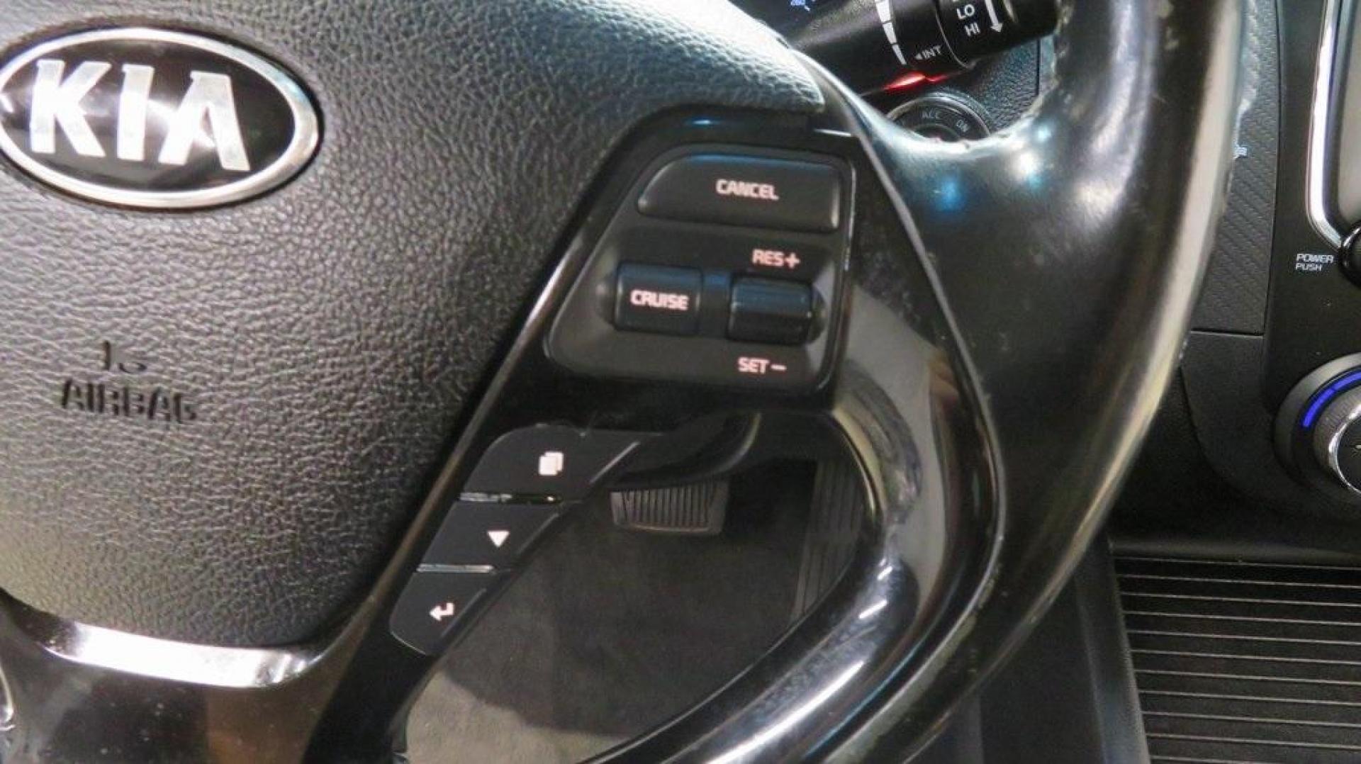 2017 Silky Silver /Black Kia Forte EX (3KPFL4A8XHE) with an 2.0L I4 DOHC Dual CVVT engine, Automatic transmission, located at 15300 Midway Rd., Addison, TX, 75001, (972) 702-0011, 32.958321, -96.838074 - 2017 Kia Forte LX<br>Available Now at Midway Auto Group Addison, Texas<br><br>Reliable, efficient, and stylish, the 2017 Kia Forte LX makes an excellent choice for drivers seeking a comfortable and affordable daily driver. Perfect for navigating Addison streets or commuting across the Dallas-Fort W - Photo#17