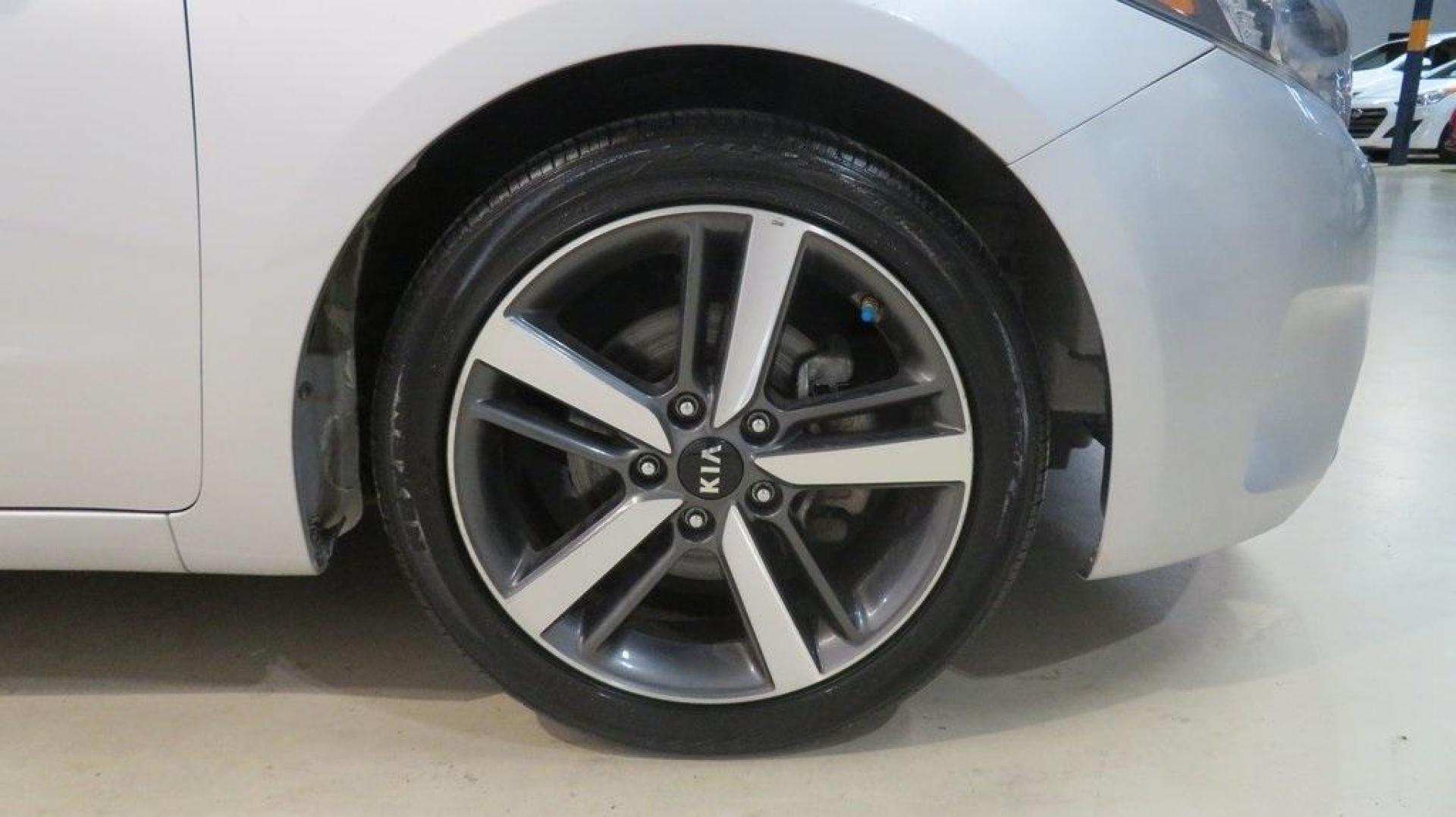 2017 Silky Silver /Black Kia Forte EX (3KPFL4A8XHE) with an 2.0L I4 DOHC Dual CVVT engine, Automatic transmission, located at 15300 Midway Rd., Addison, TX, 75001, (972) 702-0011, 32.958321, -96.838074 - 2017 Kia Forte LX<br>Available Now at Midway Auto Group Addison, Texas<br><br>Reliable, efficient, and stylish, the 2017 Kia Forte LX makes an excellent choice for drivers seeking a comfortable and affordable daily driver. Perfect for navigating Addison streets or commuting across the Dallas-Fort W - Photo#7