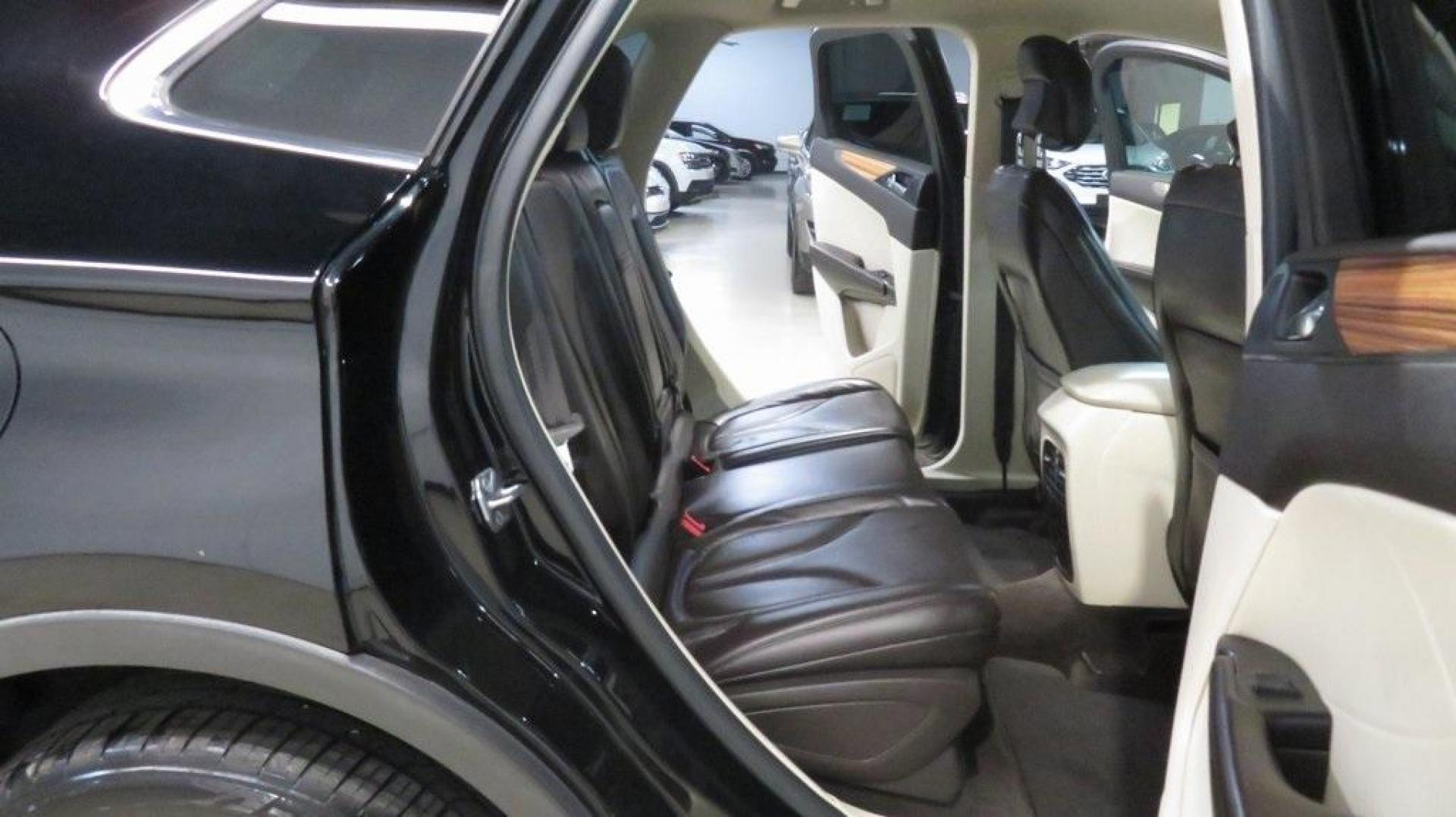 2016 Velvet /White Sands/Espresso Lincoln MKC Select (5LMCJ2C9XGU) with an EcoBoost 2.0L I4 GTDi DOHC Turbocharged VCT engine, Automatic transmission, located at 15300 Midway Rd., Addison, TX, 75001, (972) 702-0011, 32.958321, -96.838074 - 2016 Lincoln MKC Reserve<br>Now Available at Midway Auto Group Addison, Texas<br><br>The 2016 Lincoln MKC Reserve brings luxury, performance, and cutting-edge technology together in a stylish compact SUV. Whether cruising through Addison or exploring Texas highways, this MKC offers refined comfort, - Photo#15