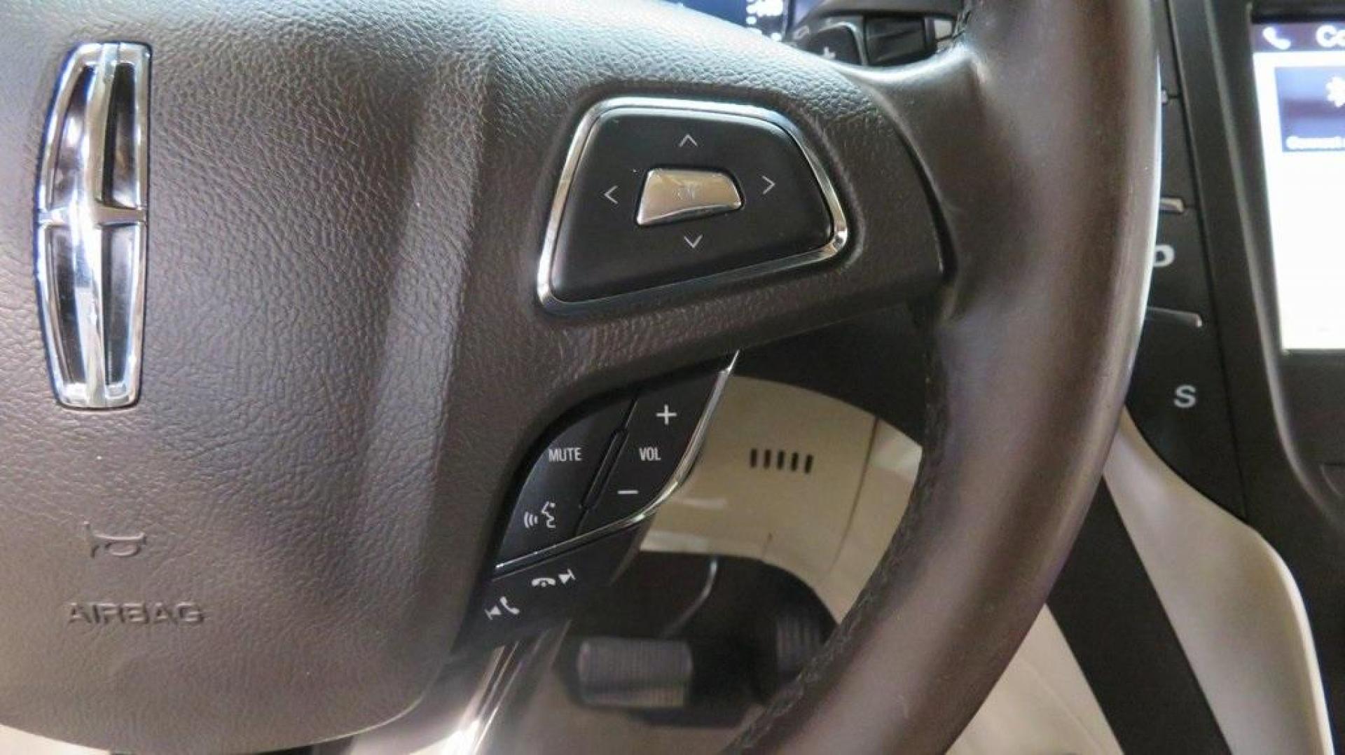 2016 Velvet /White Sands/Espresso Lincoln MKC Select (5LMCJ2C9XGU) with an EcoBoost 2.0L I4 GTDi DOHC Turbocharged VCT engine, Automatic transmission, located at 15300 Midway Rd., Addison, TX, 75001, (972) 702-0011, 32.958321, -96.838074 - 2016 Lincoln MKC Reserve<br>Now Available at Midway Auto Group Addison, Texas<br><br>The 2016 Lincoln MKC Reserve brings luxury, performance, and cutting-edge technology together in a stylish compact SUV. Whether cruising through Addison or exploring Texas highways, this MKC offers refined comfort, - Photo#23