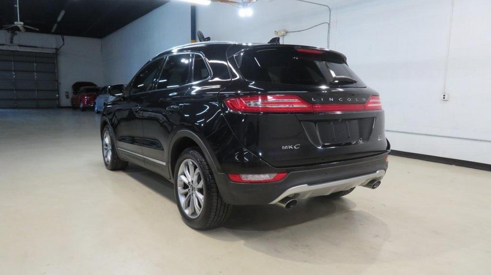 2016 Velvet /White Sands/Espresso Lincoln MKC Select (5LMCJ2C9XGU) with an EcoBoost 2.0L I4 GTDi DOHC Turbocharged VCT engine, Automatic transmission, located at 15300 Midway Rd., Addison, TX, 75001, (972) 702-0011, 32.958321, -96.838074 - 2016 Lincoln MKC Reserve<br>Now Available at Midway Auto Group Addison, Texas<br><br>The 2016 Lincoln MKC Reserve brings luxury, performance, and cutting-edge technology together in a stylish compact SUV. Whether cruising through Addison or exploring Texas highways, this MKC offers refined comfort, - Photo#3