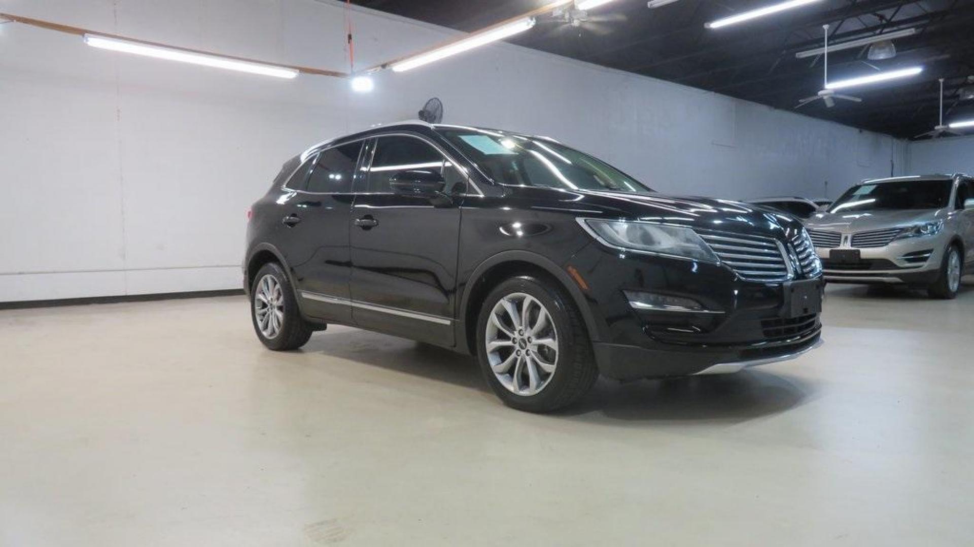 2016 Velvet /White Sands/Espresso Lincoln MKC Select (5LMCJ2C9XGU) with an EcoBoost 2.0L I4 GTDi DOHC Turbocharged VCT engine, Automatic transmission, located at 15300 Midway Rd., Addison, TX, 75001, (972) 702-0011, 32.958321, -96.838074 - 2016 Lincoln MKC Reserve<br>Now Available at Midway Auto Group Addison, Texas<br><br>The 2016 Lincoln MKC Reserve brings luxury, performance, and cutting-edge technology together in a stylish compact SUV. Whether cruising through Addison or exploring Texas highways, this MKC offers refined comfort, - Photo#6