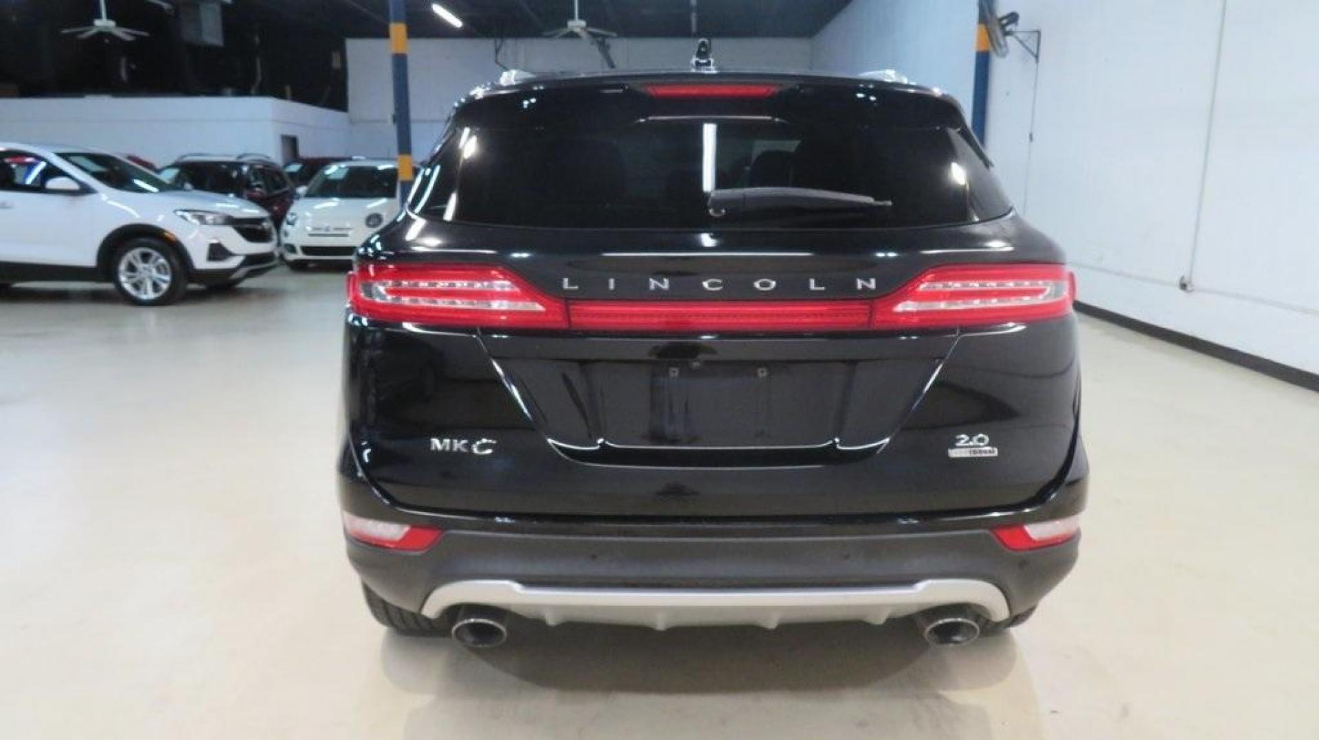 2016 Velvet /White Sands/Espresso Lincoln MKC Select (5LMCJ2C9XGU) with an EcoBoost 2.0L I4 GTDi DOHC Turbocharged VCT engine, Automatic transmission, located at 15300 Midway Rd., Addison, TX, 75001, (972) 702-0011, 32.958321, -96.838074 - 2016 Lincoln MKC Reserve<br>Now Available at Midway Auto Group Addison, Texas<br><br>The 2016 Lincoln MKC Reserve brings luxury, performance, and cutting-edge technology together in a stylish compact SUV. Whether cruising through Addison or exploring Texas highways, this MKC offers refined comfort, - Photo#7