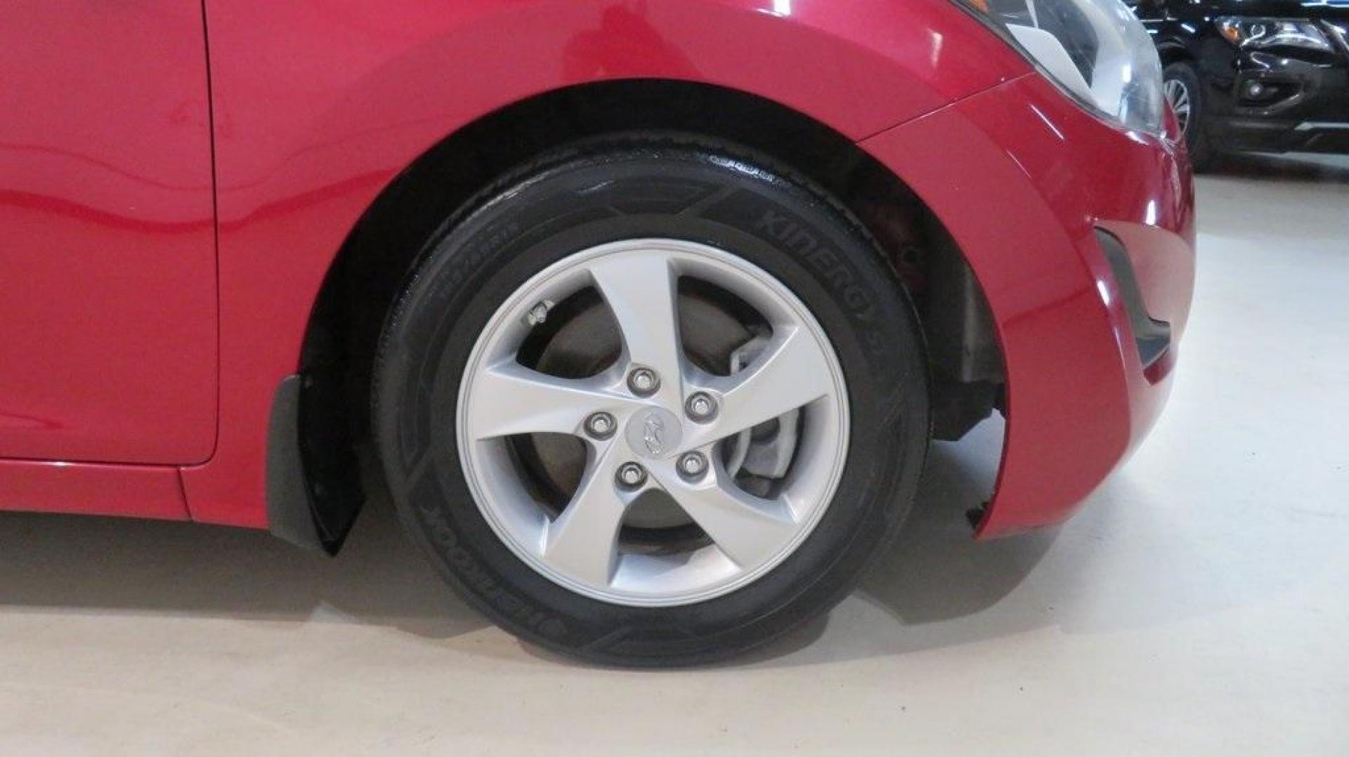 2016 Geranium Red /Gray Hyundai Elantra SE (KMHDH4AE9GU) with an 1.8L 4-Cylinder DOHC 16V Dual CVVT engine, Automatic transmission, located at 15300 Midway Rd., Addison, TX, 75001, (972) 702-0011, 32.958321, -96.838074 - 2016 Hyundai Elantra SE<br>Now Available at Midway Auto Group Addison, Texas<br><br>Smart, efficient, and comfortable, the 2016 Hyundai Elantra SE delivers an outstanding blend of value, reliability, and style. Whether commuting through Addison or heading out on a weekend road trip across Texas, th - Photo#11