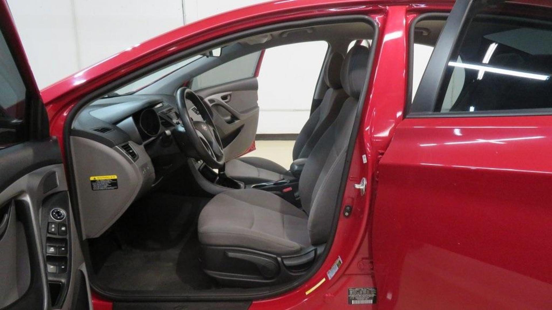 2016 Geranium Red /Gray Hyundai Elantra SE (KMHDH4AE9GU) with an 1.8L 4-Cylinder DOHC 16V Dual CVVT engine, Automatic transmission, located at 15300 Midway Rd., Addison, TX, 75001, (972) 702-0011, 32.958321, -96.838074 - 2016 Hyundai Elantra SE<br>Now Available at Midway Auto Group Addison, Texas<br><br>Smart, efficient, and comfortable, the 2016 Hyundai Elantra SE delivers an outstanding blend of value, reliability, and style. Whether commuting through Addison or heading out on a weekend road trip across Texas, th - Photo#13