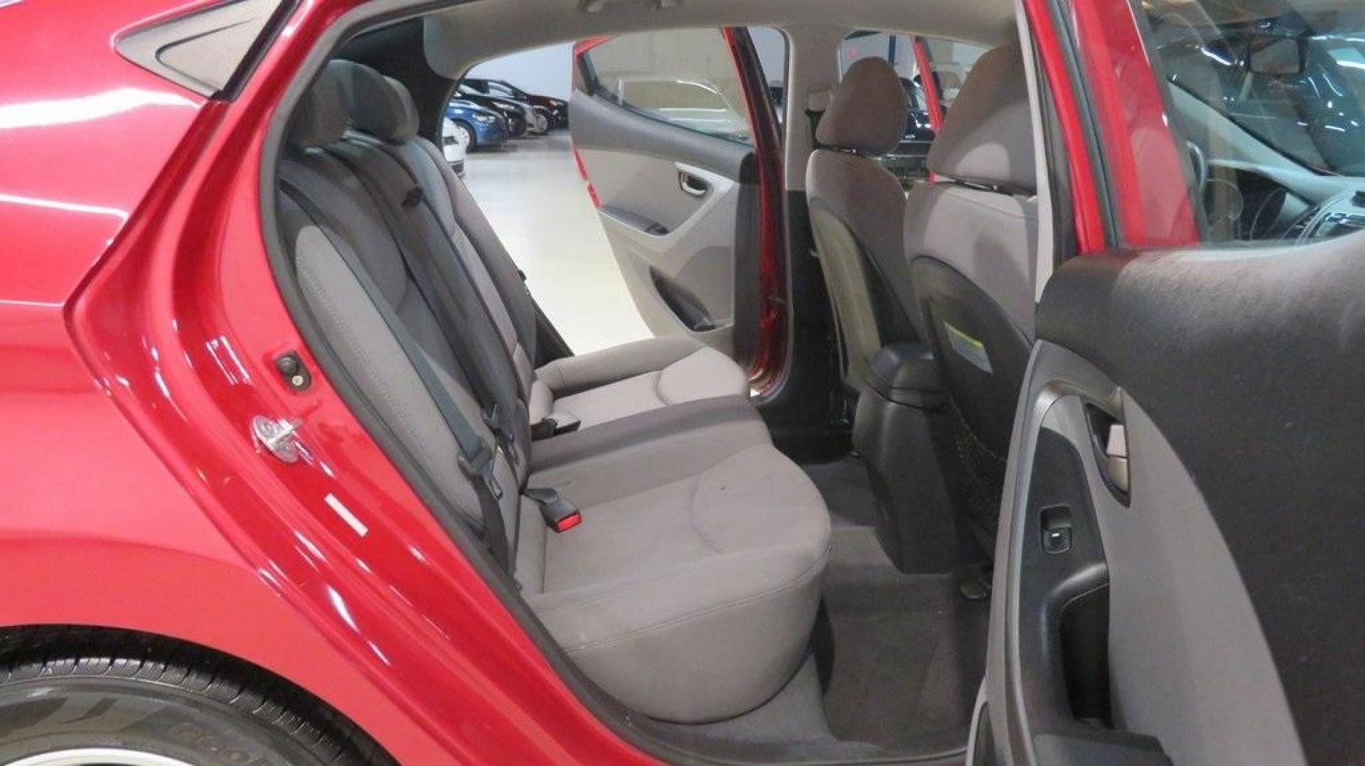 2016 Geranium Red /Gray Hyundai Elantra SE (KMHDH4AE9GU) with an 1.8L 4-Cylinder DOHC 16V Dual CVVT engine, Automatic transmission, located at 15300 Midway Rd., Addison, TX, 75001, (972) 702-0011, 32.958321, -96.838074 - 2016 Hyundai Elantra SE<br>Now Available at Midway Auto Group Addison, Texas<br><br>Smart, efficient, and comfortable, the 2016 Hyundai Elantra SE delivers an outstanding blend of value, reliability, and style. Whether commuting through Addison or heading out on a weekend road trip across Texas, th - Photo#15