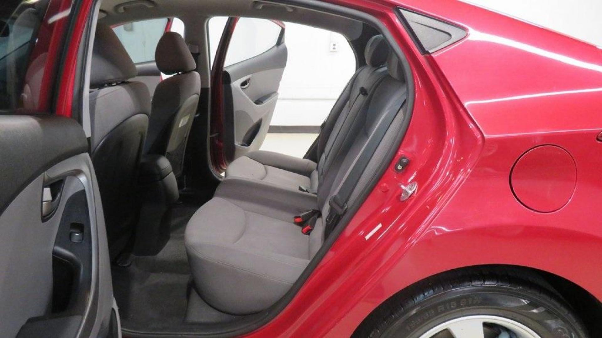 2016 Geranium Red /Gray Hyundai Elantra SE (KMHDH4AE9GU) with an 1.8L 4-Cylinder DOHC 16V Dual CVVT engine, Automatic transmission, located at 15300 Midway Rd., Addison, TX, 75001, (972) 702-0011, 32.958321, -96.838074 - 2016 Hyundai Elantra SE<br>Now Available at Midway Auto Group Addison, Texas<br><br>Smart, efficient, and comfortable, the 2016 Hyundai Elantra SE delivers an outstanding blend of value, reliability, and style. Whether commuting through Addison or heading out on a weekend road trip across Texas, th - Photo#16