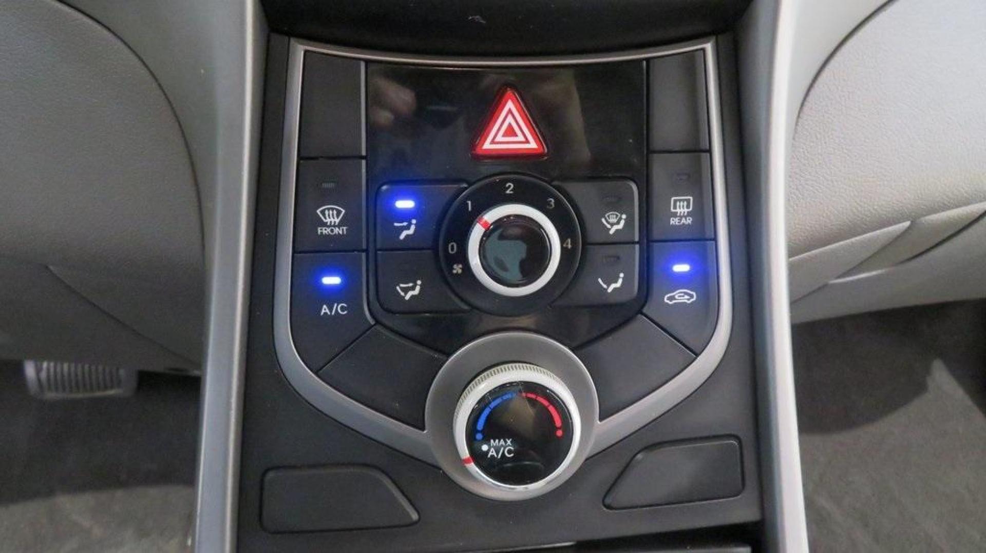 2016 Geranium Red /Gray Hyundai Elantra SE (KMHDH4AE9GU) with an 1.8L 4-Cylinder DOHC 16V Dual CVVT engine, Automatic transmission, located at 15300 Midway Rd., Addison, TX, 75001, (972) 702-0011, 32.958321, -96.838074 - 2016 Hyundai Elantra SE<br>Now Available at Midway Auto Group Addison, Texas<br><br>Smart, efficient, and comfortable, the 2016 Hyundai Elantra SE delivers an outstanding blend of value, reliability, and style. Whether commuting through Addison or heading out on a weekend road trip across Texas, th - Photo#19