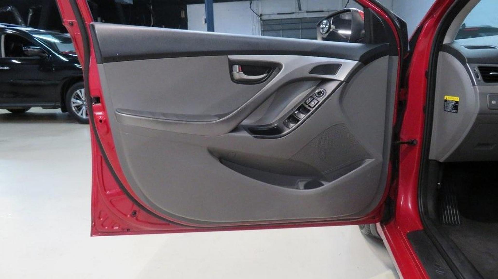 2016 Geranium Red /Gray Hyundai Elantra SE (KMHDH4AE9GU) with an 1.8L 4-Cylinder DOHC 16V Dual CVVT engine, Automatic transmission, located at 15300 Midway Rd., Addison, TX, 75001, (972) 702-0011, 32.958321, -96.838074 - 2016 Hyundai Elantra SE<br>Now Available at Midway Auto Group Addison, Texas<br><br>Smart, efficient, and comfortable, the 2016 Hyundai Elantra SE delivers an outstanding blend of value, reliability, and style. Whether commuting through Addison or heading out on a weekend road trip across Texas, th - Photo#22