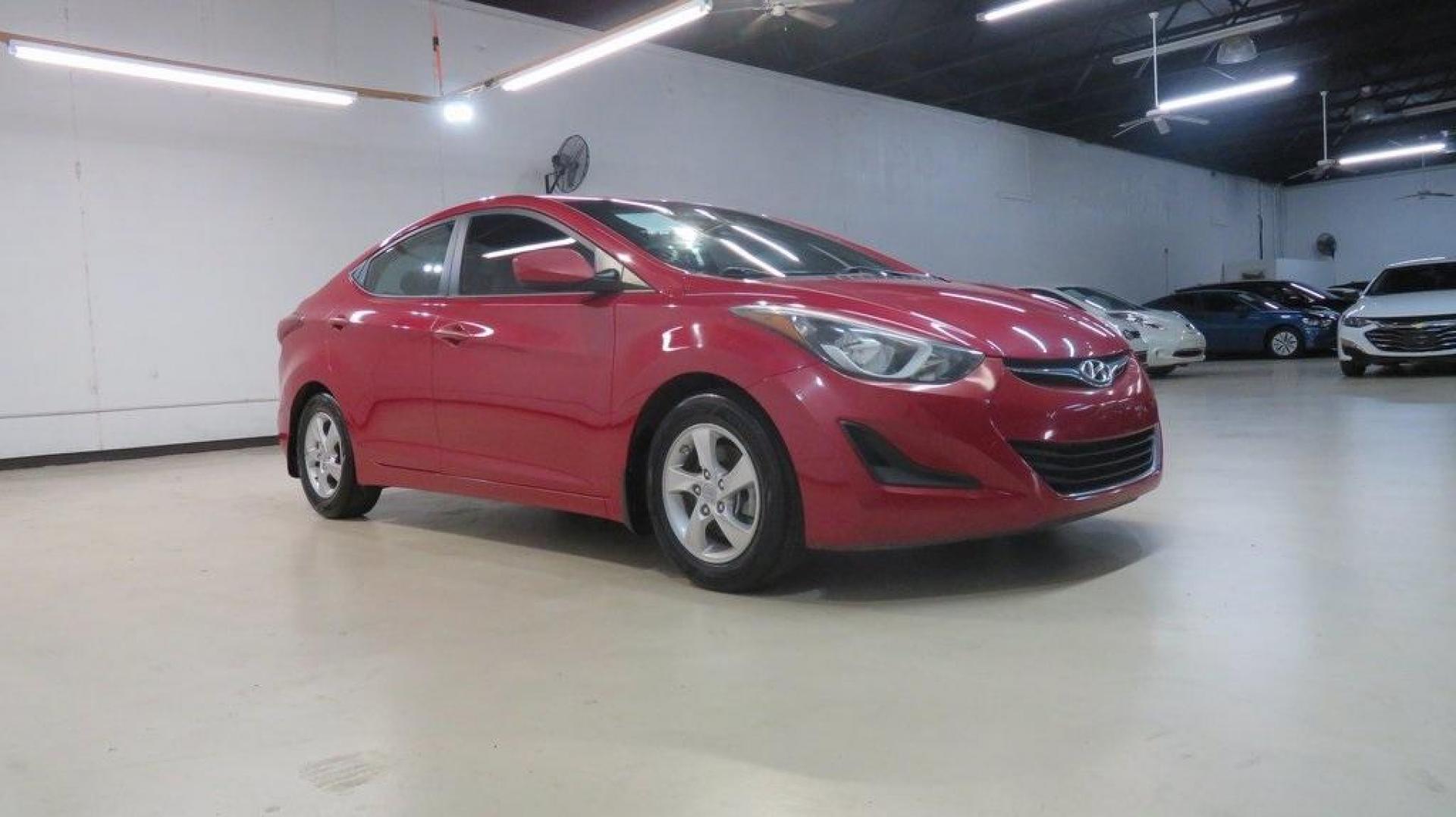 2016 Geranium Red /Gray Hyundai Elantra SE (KMHDH4AE9GU) with an 1.8L 4-Cylinder DOHC 16V Dual CVVT engine, Automatic transmission, located at 15300 Midway Rd., Addison, TX, 75001, (972) 702-0011, 32.958321, -96.838074 - 2016 Hyundai Elantra SE<br>Now Available at Midway Auto Group Addison, Texas<br><br>Smart, efficient, and comfortable, the 2016 Hyundai Elantra SE delivers an outstanding blend of value, reliability, and style. Whether commuting through Addison or heading out on a weekend road trip across Texas, th - Photo#6