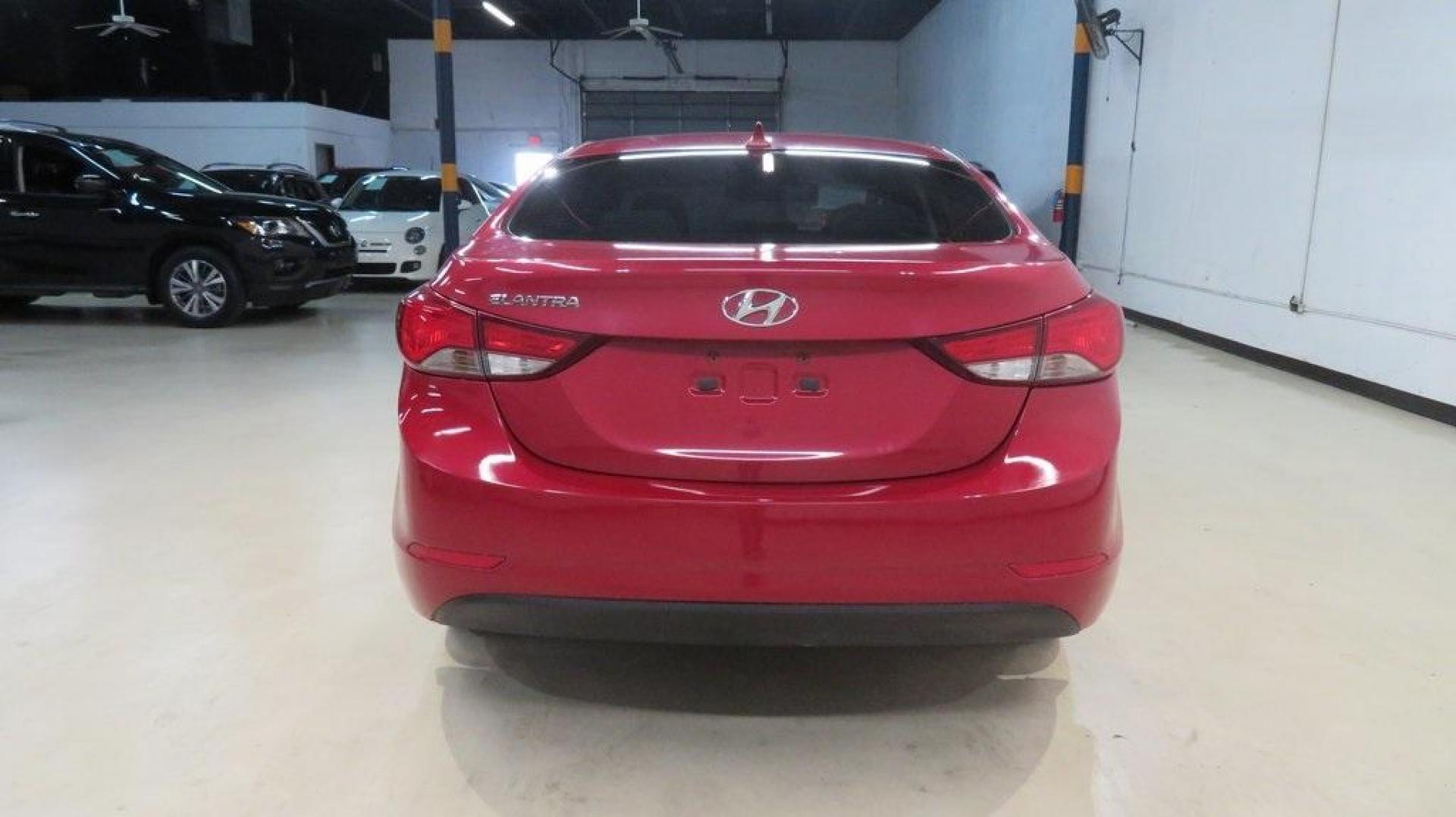 2016 Geranium Red /Gray Hyundai Elantra SE (KMHDH4AE9GU) with an 1.8L 4-Cylinder DOHC 16V Dual CVVT engine, Automatic transmission, located at 15300 Midway Rd., Addison, TX, 75001, (972) 702-0011, 32.958321, -96.838074 - 2016 Hyundai Elantra SE<br>Now Available at Midway Auto Group Addison, Texas<br><br>Smart, efficient, and comfortable, the 2016 Hyundai Elantra SE delivers an outstanding blend of value, reliability, and style. Whether commuting through Addison or heading out on a weekend road trip across Texas, th - Photo#7