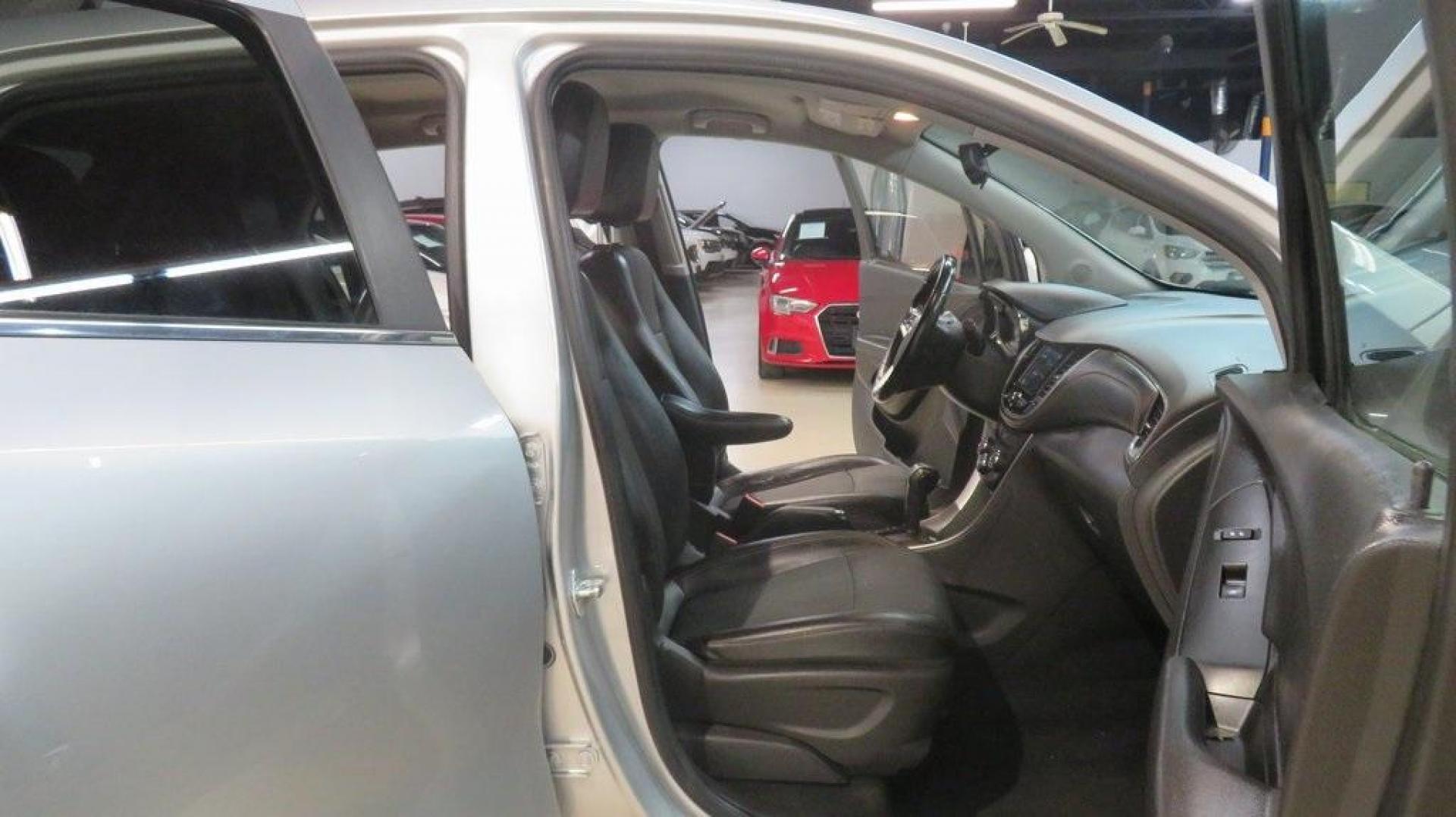 2019 Silver Ice Metallic /Jet Black Chevrolet Trax LT (KL7CJLSB1KB) with an ECOTEC 1.4L I4 SMPI DOHC Turbocharged VVT engine, Automatic transmission, located at 15300 Midway Rd., Addison, TX, 75001, (972) 702-0011, 32.958321, -96.838074 - 2019 Chevrolet Trax LT<br>Now Available at Midway Auto Group Addison, Texas<br><br>Compact, agile, and packed with modern technology, the 2019 Chevrolet Trax LT is the ideal urban SUV for drivers seeking versatility and efficiency. Whether navigating the busy streets of Addison or setting out on lo - Photo#13
