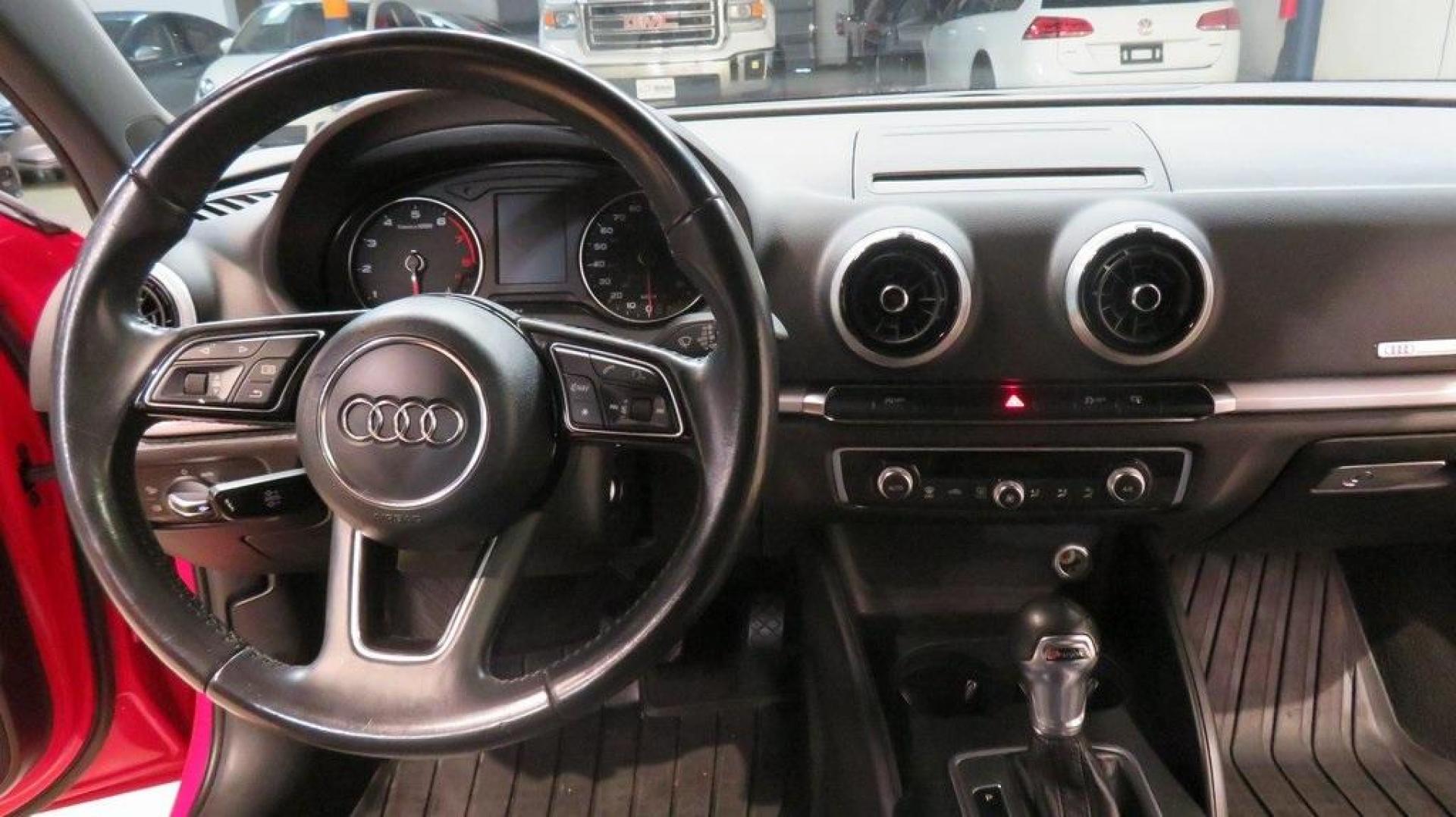 2017 Tango Red /Black Audi A3 2.0T Premium (WAUAUGFF6H1) with an 2.0L 4-Cylinder TFSI engine, Automatic transmission, located at 15300 Midway Rd., Addison, TX, 75001, (972) 702-0011, 32.958321, -96.838074 - 2017 Audi A3 Premium<br>Now Available at Midway Auto Group Addison, Texas<br><br>Sophisticated, sporty, and luxurious, the 2017 Audi A3 Premium combines dynamic performance with cutting-edge technology and elegant styling. Whether navigating city streets around Addison or cruising across Texas, thi - Photo#19