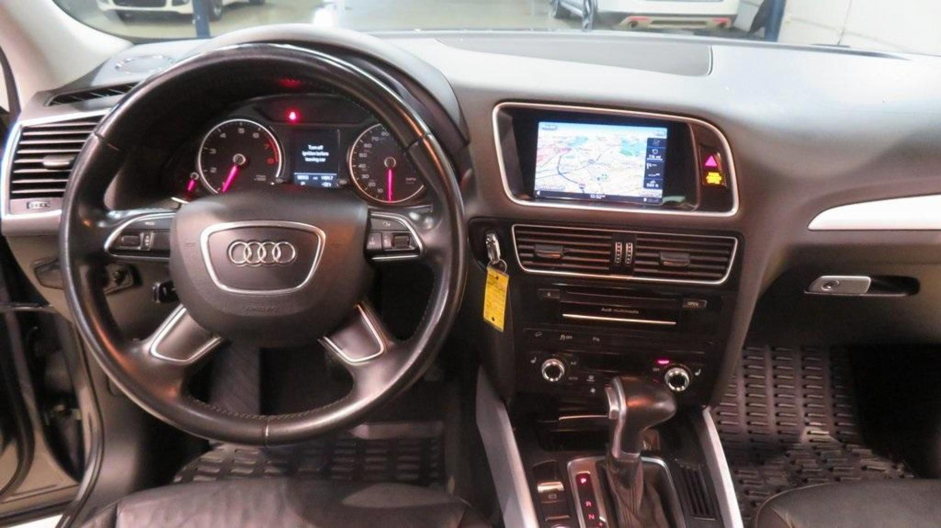 2016 Turquoise /Black/Cognac Audi Q5 2.0T Premium Plus (WA1L2AFP0GA) with an 2.0L 4-Cylinder TFSI engine, Automatic transmission, located at 15300 Midway Rd., Addison, TX, 75001, (972) 702-0011, 32.958321, -96.838074 - 2016 Audi Q5 Premium Plus<br>Available Now at Midway Auto Group Addison, Texas<br><br>Step into refined luxury and dynamic performance with the 2016 Audi Q5 Premium Plus. Offering the perfect blend of sophistication, utility, and Quattro all-wheel-drive capability, this premium SUV is designed for - Photo#17