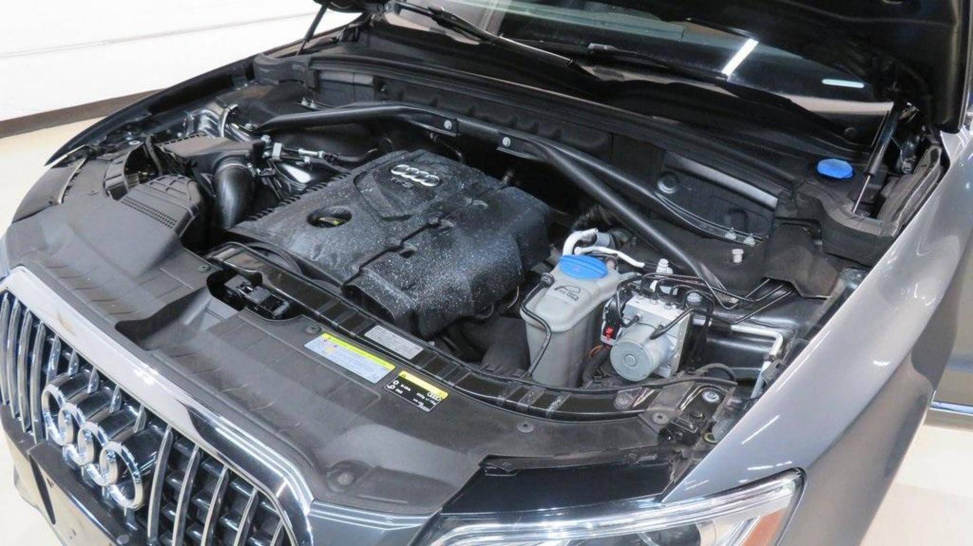 2016 Turquoise /Black/Cognac Audi Q5 2.0T Premium Plus (WA1L2AFP0GA) with an 2.0L 4-Cylinder TFSI engine, Automatic transmission, located at 15300 Midway Rd., Addison, TX, 75001, (972) 702-0011, 32.958321, -96.838074 - 2016 Audi Q5 Premium Plus<br>Available Now at Midway Auto Group Addison, Texas<br><br>Step into refined luxury and dynamic performance with the 2016 Audi Q5 Premium Plus. Offering the perfect blend of sophistication, utility, and Quattro all-wheel-drive capability, this premium SUV is designed for - Photo#29