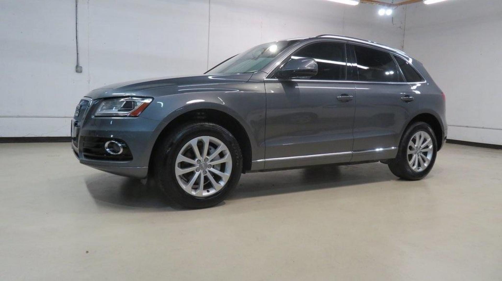 2016 Turquoise /Black/Cognac Audi Q5 2.0T Premium Plus (WA1L2AFP0GA) with an 2.0L 4-Cylinder TFSI engine, Automatic transmission, located at 15300 Midway Rd., Addison, TX, 75001, (972) 702-0011, 32.958321, -96.838074 - 2016 Audi Q5 Premium Plus<br>Available Now at Midway Auto Group Addison, Texas<br><br>Step into refined luxury and dynamic performance with the 2016 Audi Q5 Premium Plus. Offering the perfect blend of sophistication, utility, and Quattro all-wheel-drive capability, this premium SUV is designed for - Photo#4