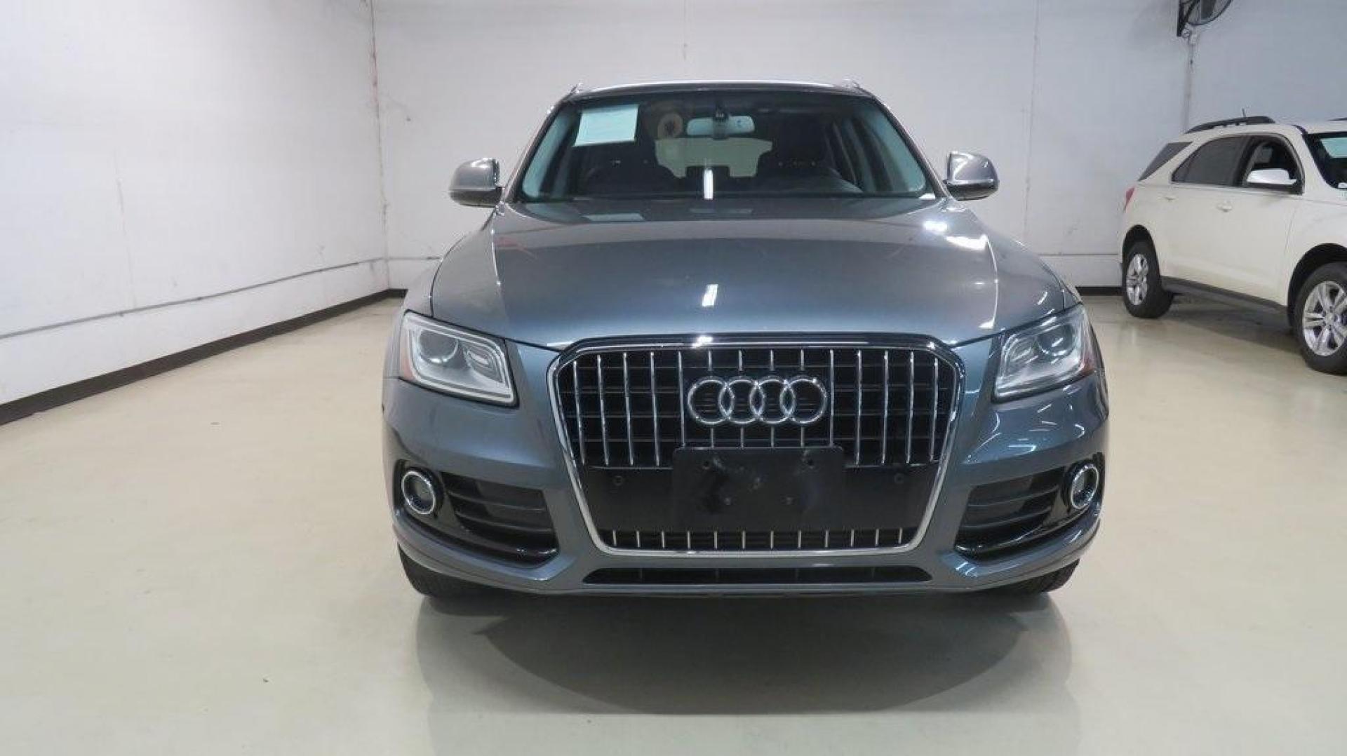 2016 Turquoise /Black/Cognac Audi Q5 2.0T Premium Plus (WA1L2AFP0GA) with an 2.0L 4-Cylinder TFSI engine, Automatic transmission, located at 15300 Midway Rd., Addison, TX, 75001, (972) 702-0011, 32.958321, -96.838074 - 2016 Audi Q5 Premium Plus<br>Available Now at Midway Auto Group Addison, Texas<br><br>Step into refined luxury and dynamic performance with the 2016 Audi Q5 Premium Plus. Offering the perfect blend of sophistication, utility, and Quattro all-wheel-drive capability, this premium SUV is designed for - Photo#5