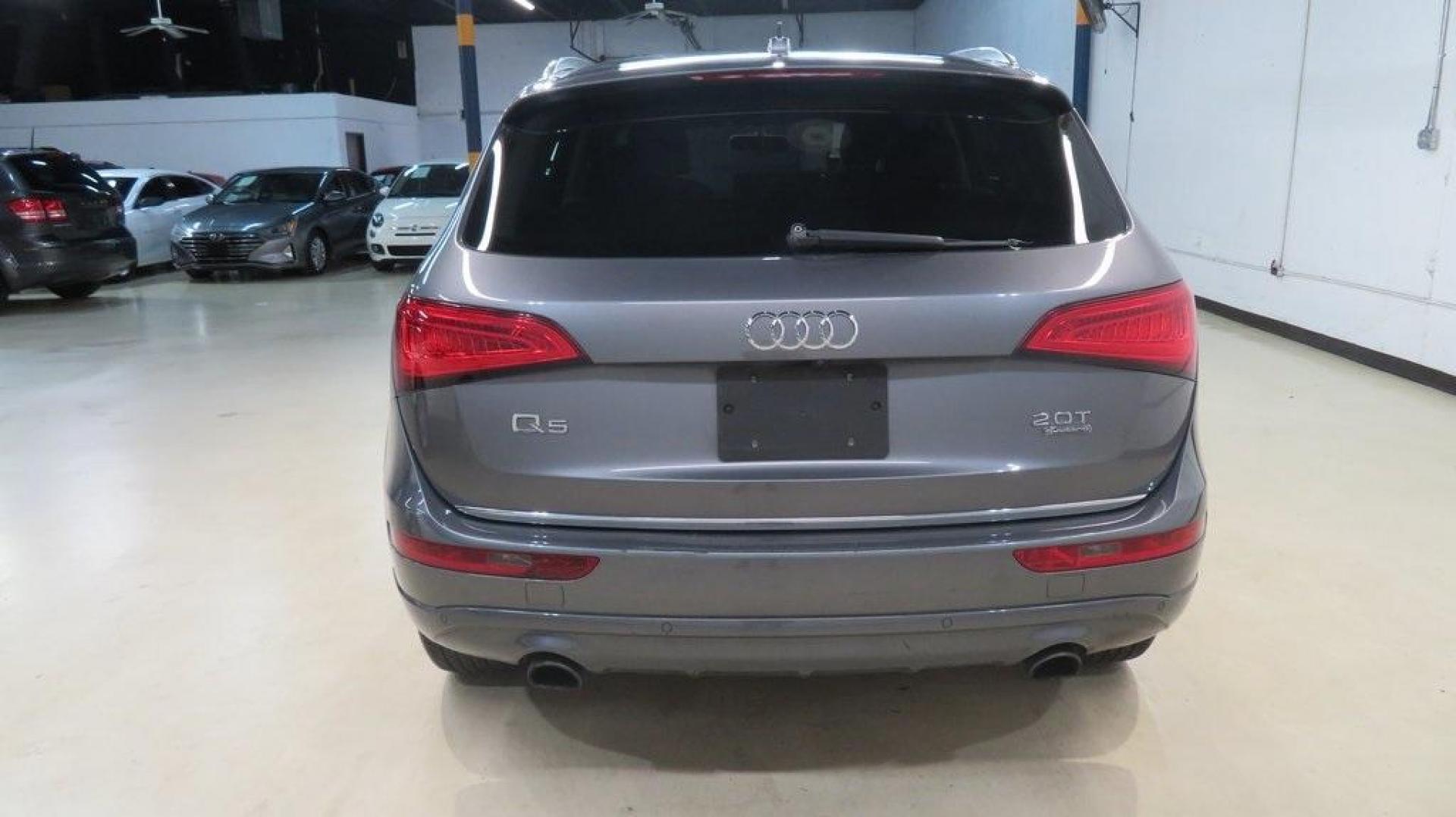 2016 Turquoise /Black/Cognac Audi Q5 2.0T Premium Plus (WA1L2AFP0GA) with an 2.0L 4-Cylinder TFSI engine, Automatic transmission, located at 15300 Midway Rd., Addison, TX, 75001, (972) 702-0011, 32.958321, -96.838074 - 2016 Audi Q5 Premium Plus<br>Available Now at Midway Auto Group Addison, Texas<br><br>Step into refined luxury and dynamic performance with the 2016 Audi Q5 Premium Plus. Offering the perfect blend of sophistication, utility, and Quattro all-wheel-drive capability, this premium SUV is designed for - Photo#7