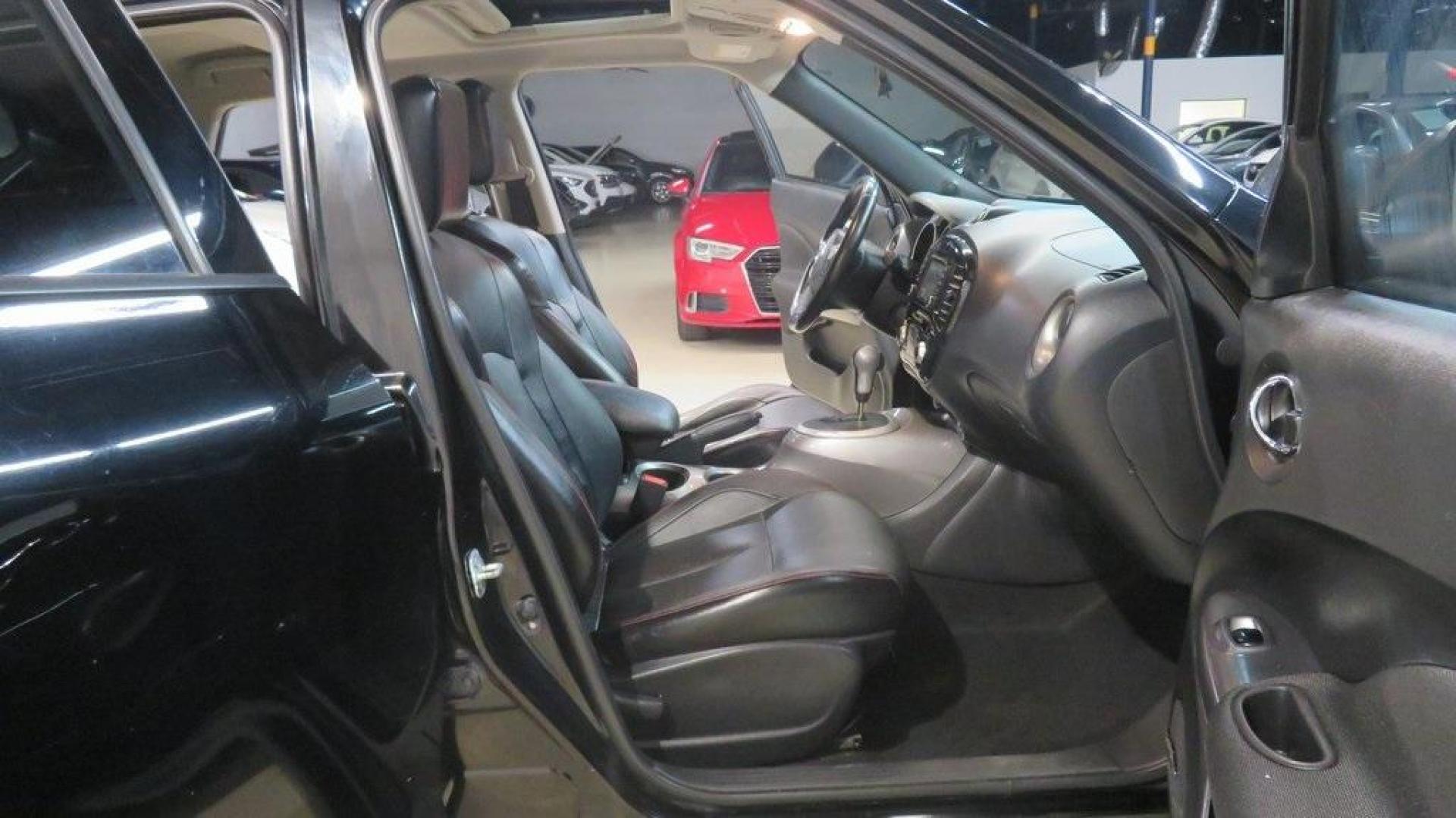 2017 Super Black /Black Nissan Juke SL (JN8AF5MV9HT) with an 1.6L I4 DOHC 16V engine, CVT transmission, located at 15300 Midway Rd., Addison, TX, 75001, (972) 702-0011, 32.958321, -96.838074 - 2017 Nissan Juke SV<br>Now Available at Midway Auto Group Addison, Texas<br><br>The 2017 Nissan Juke SV brings bold design, turbocharged performance, and smart versatility to the compact crossover segment. Perfectly sized for maneuvering through Addisons streets yet sporty enough for weekend advent - Photo#14