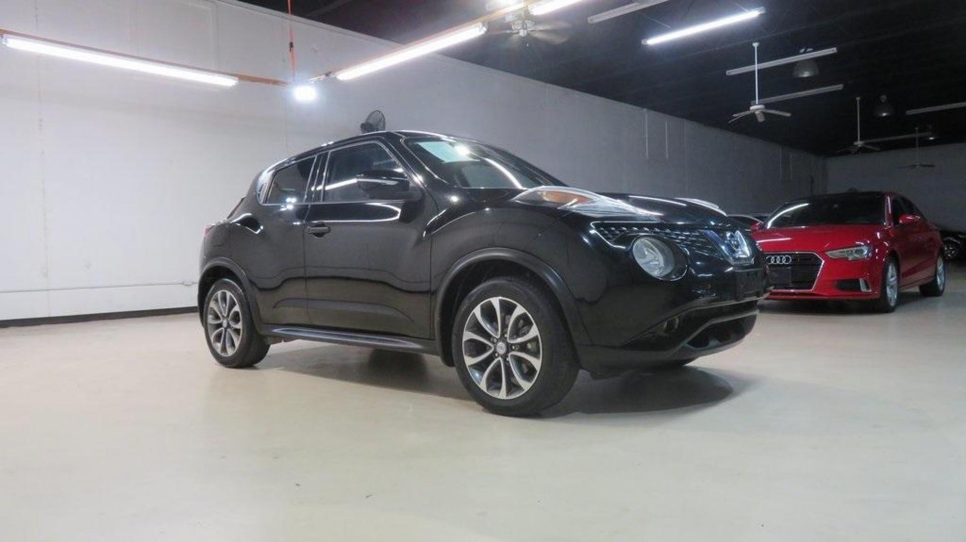 2017 Super Black /Black Nissan Juke SL (JN8AF5MV9HT) with an 1.6L I4 DOHC 16V engine, CVT transmission, located at 15300 Midway Rd., Addison, TX, 75001, (972) 702-0011, 32.958321, -96.838074 - 2017 Nissan Juke SV<br>Now Available at Midway Auto Group Addison, Texas<br><br>The 2017 Nissan Juke SV brings bold design, turbocharged performance, and smart versatility to the compact crossover segment. Perfectly sized for maneuvering through Addisons streets yet sporty enough for weekend advent - Photo#6