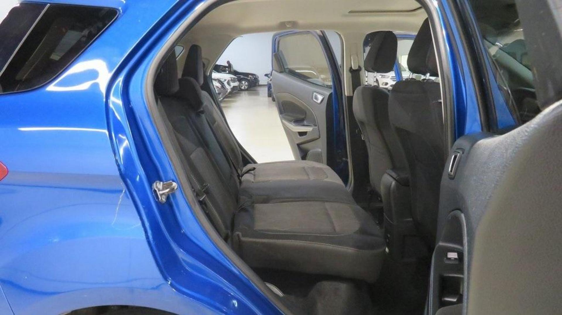 2018 Lightning Blue /Ebony Black Ford EcoSport SE (MAJ3P1TE7JC) with an EcoBoost 1.0L I3 GTDi DOHC Turbocharged VCT engine, Automatic transmission, located at 15300 Midway Rd., Addison, TX, 75001, (972) 702-0011, 32.958321, -96.838074 - 2018 Ford EcoSport SE<br>Now Available at Midway Auto Group Addison, Texas<br><br>Compact, capable, and loaded with tech, the 2018 Ford EcoSport SE is designed for today's active lifestyle. Perfectly sized for maneuvering through Addisons busy streets, yet comfortable enough for road trips across T - Photo#15