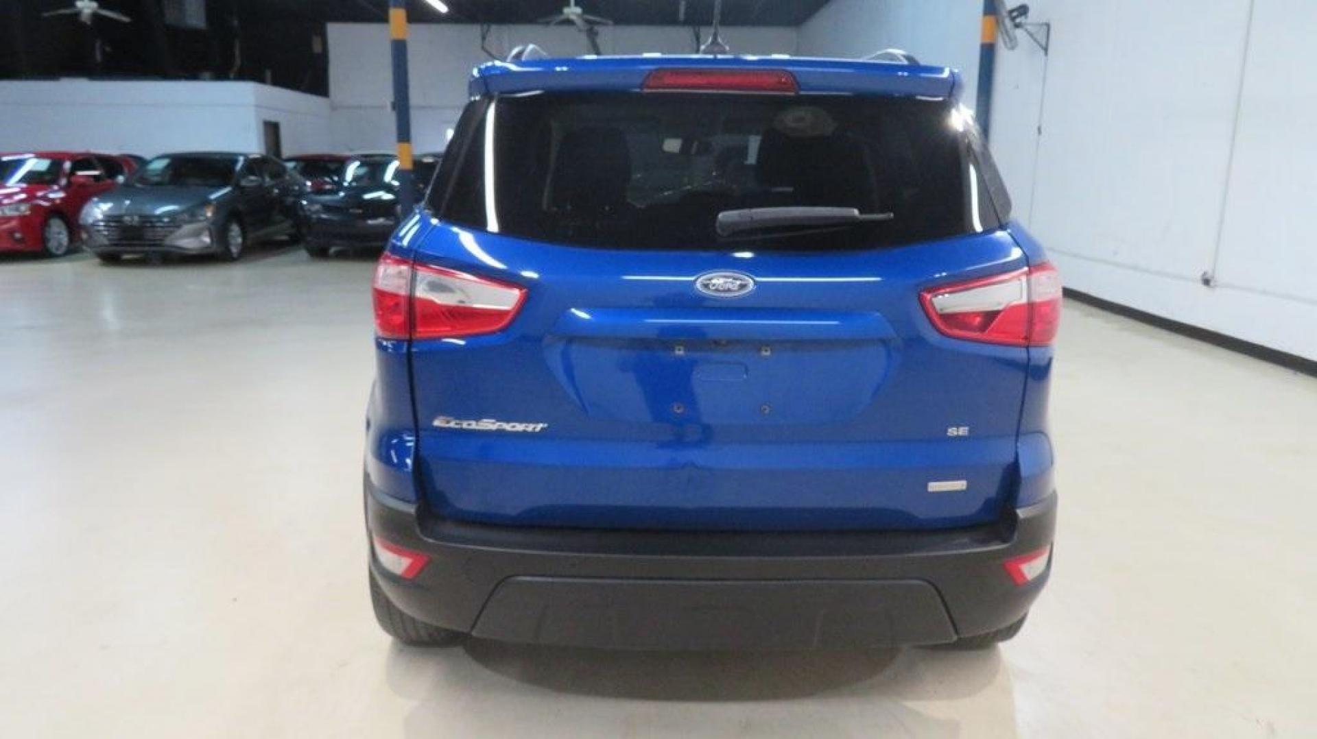 2018 Lightning Blue /Ebony Black Ford EcoSport SE (MAJ3P1TE7JC) with an EcoBoost 1.0L I3 GTDi DOHC Turbocharged VCT engine, Automatic transmission, located at 15300 Midway Rd., Addison, TX, 75001, (972) 702-0011, 32.958321, -96.838074 - 2018 Ford EcoSport SE<br>Now Available at Midway Auto Group Addison, Texas<br><br>Compact, capable, and loaded with tech, the 2018 Ford EcoSport SE is designed for today's active lifestyle. Perfectly sized for maneuvering through Addisons busy streets, yet comfortable enough for road trips across T - Photo#7