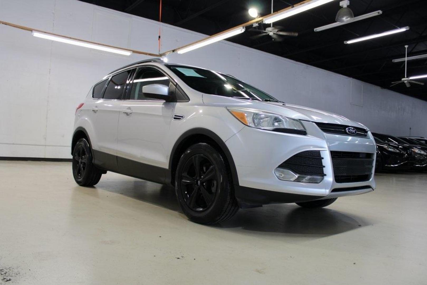 2014 Ingot Silver /Black Ford Escape SE (1FMCU0GX0EU) with an EcoBoost 1.6L I4 GTDi DOHC Turbocharged VCT engine, Automatic transmission, located at 15300 Midway Rd., Addison, TX, 75001, (972) 702-0011, 32.958321, -96.838074 - Photo#1